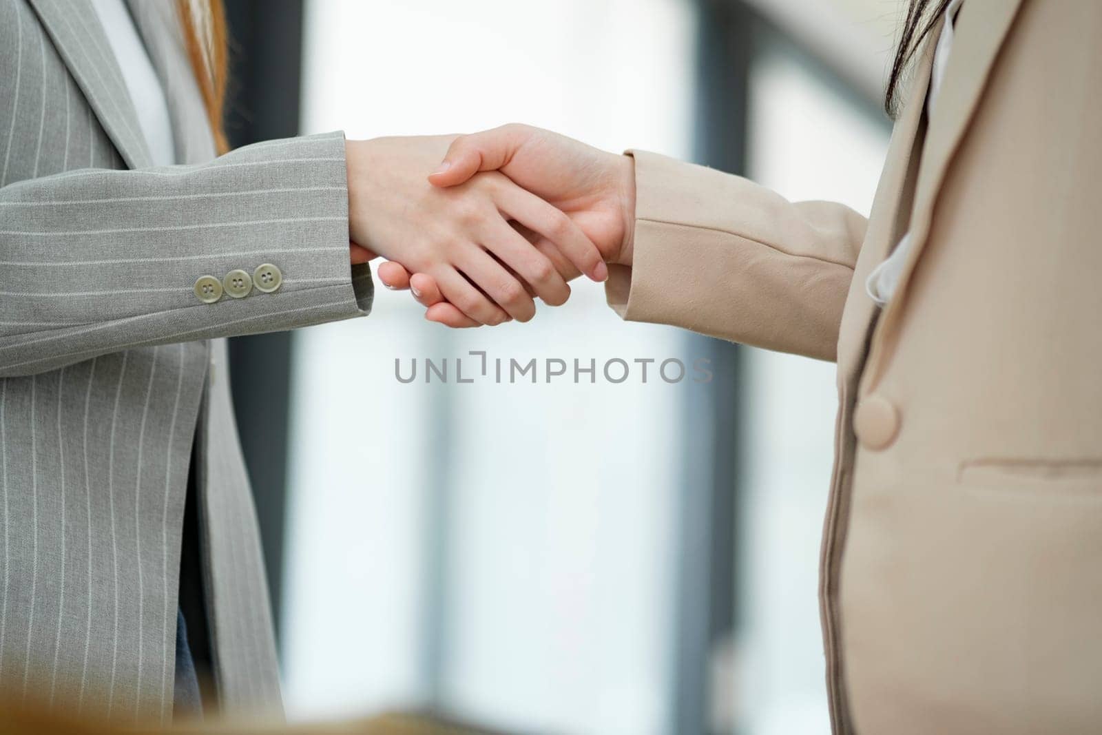 Close-up of Professional Handshake in Business Meeting. by ijeab