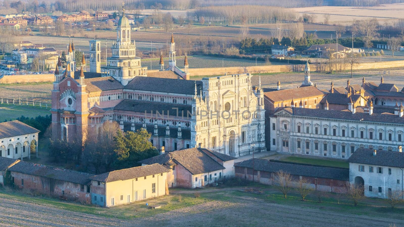 Aerial shot of Certosa di Pavia cathedral a historical monumental complex that includes a monastery and a sanctuary. Pavia ,Italy.