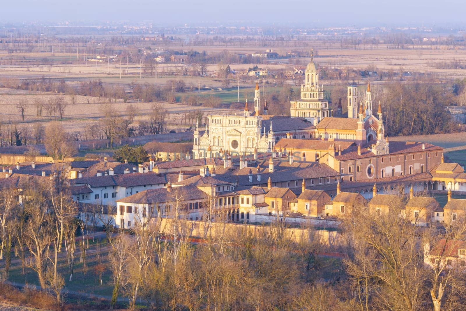 Aerial shot of Certosa di Pavia cathedral a historical monumental complex that includes a monastery and a sanctuary. Pavia ,Italy.