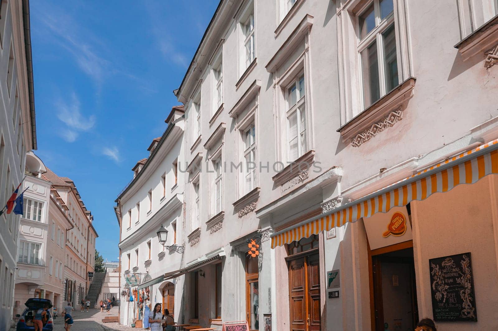 Bratislava, Slovakia, August 25, 2023: Klariska street in the old town on a sunny day