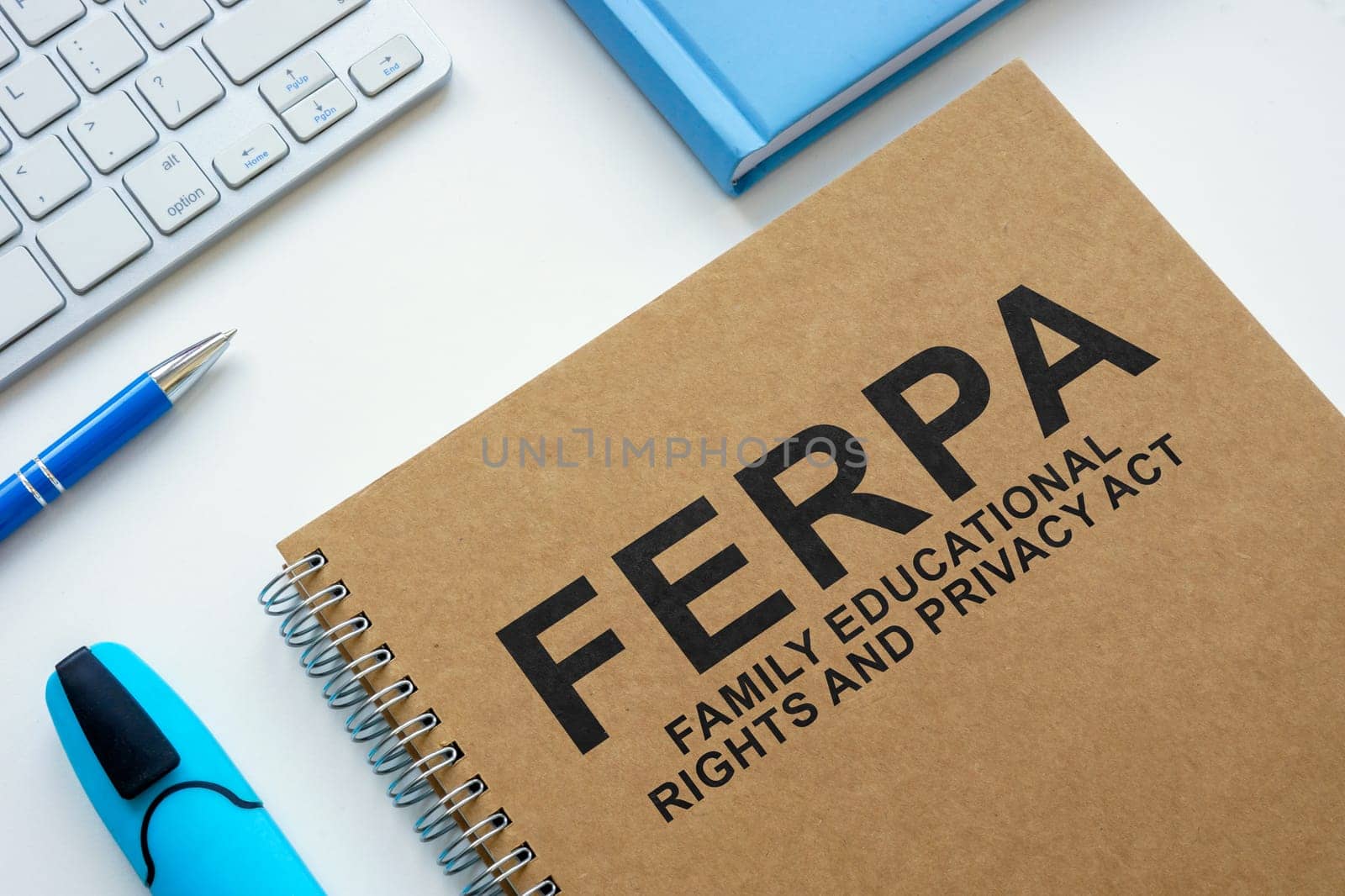 Book FERPA family educational rights and privacy act on the table. by designer491