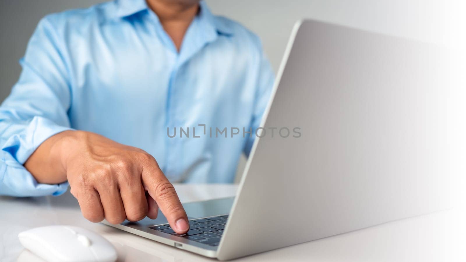Businessman using computer to login represents protection concept of cyber security and data security including secure login.