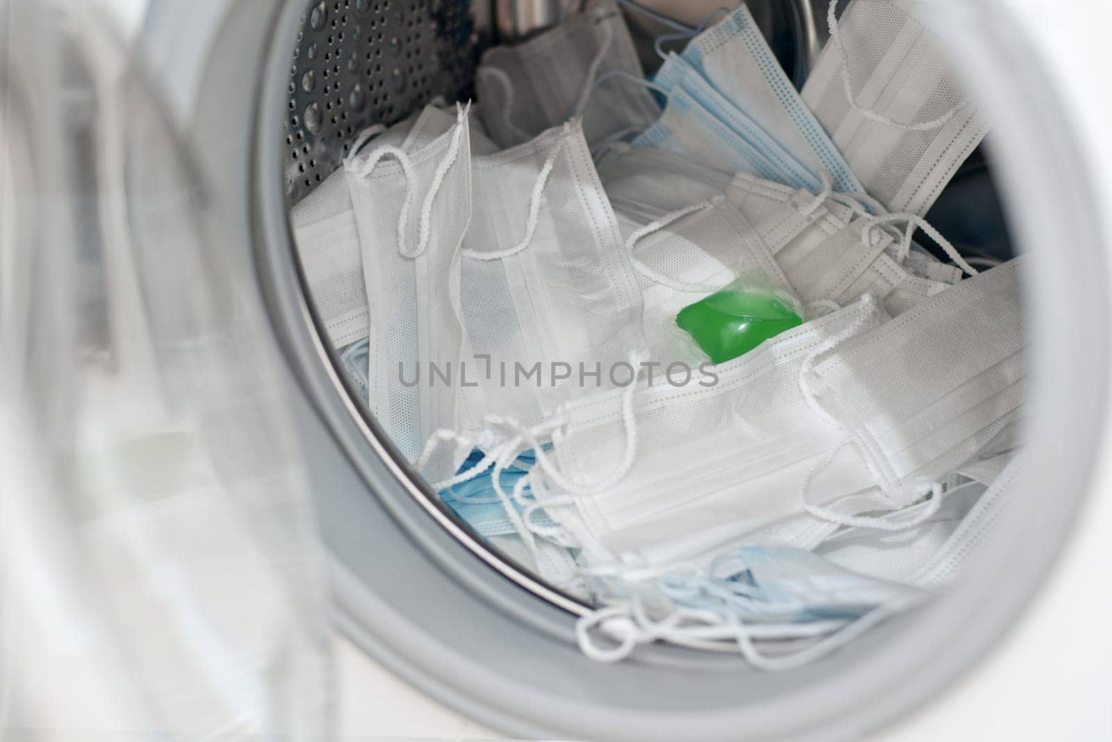 Washing disposable surgical masks with pods