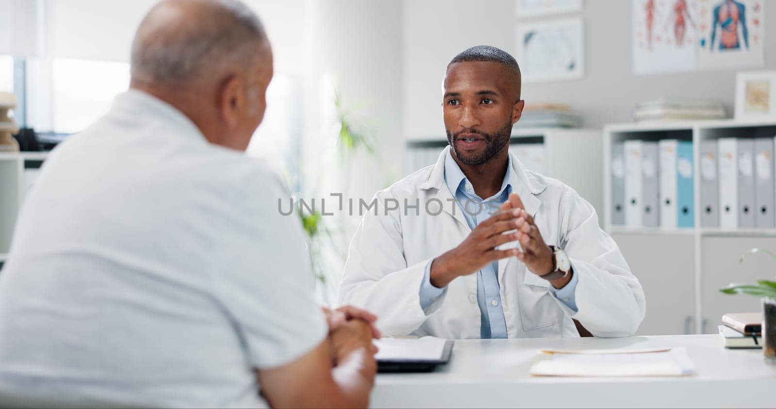 Doctor, patient and consultation with conversation for healthcare, people in office with advice or instructions for medication. Treatment, medical info and elderly care with communication at clinic.