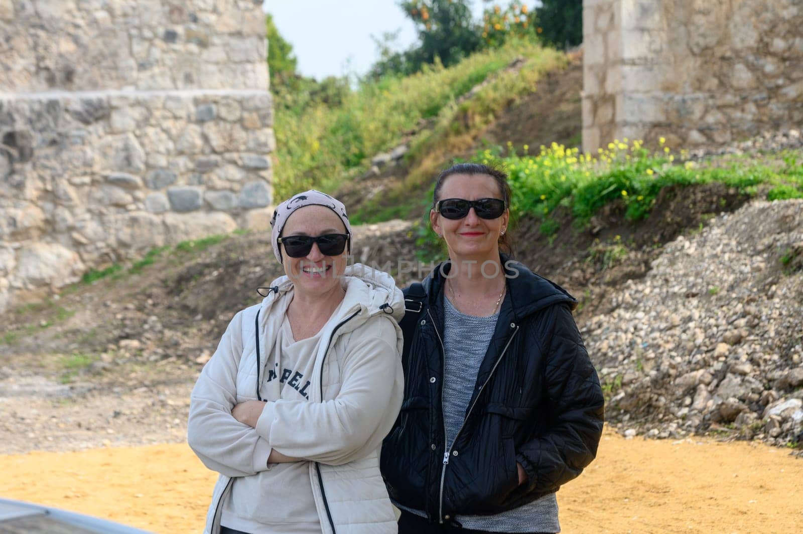 two girlfriends against the background of an old castle 1 by Mixa74