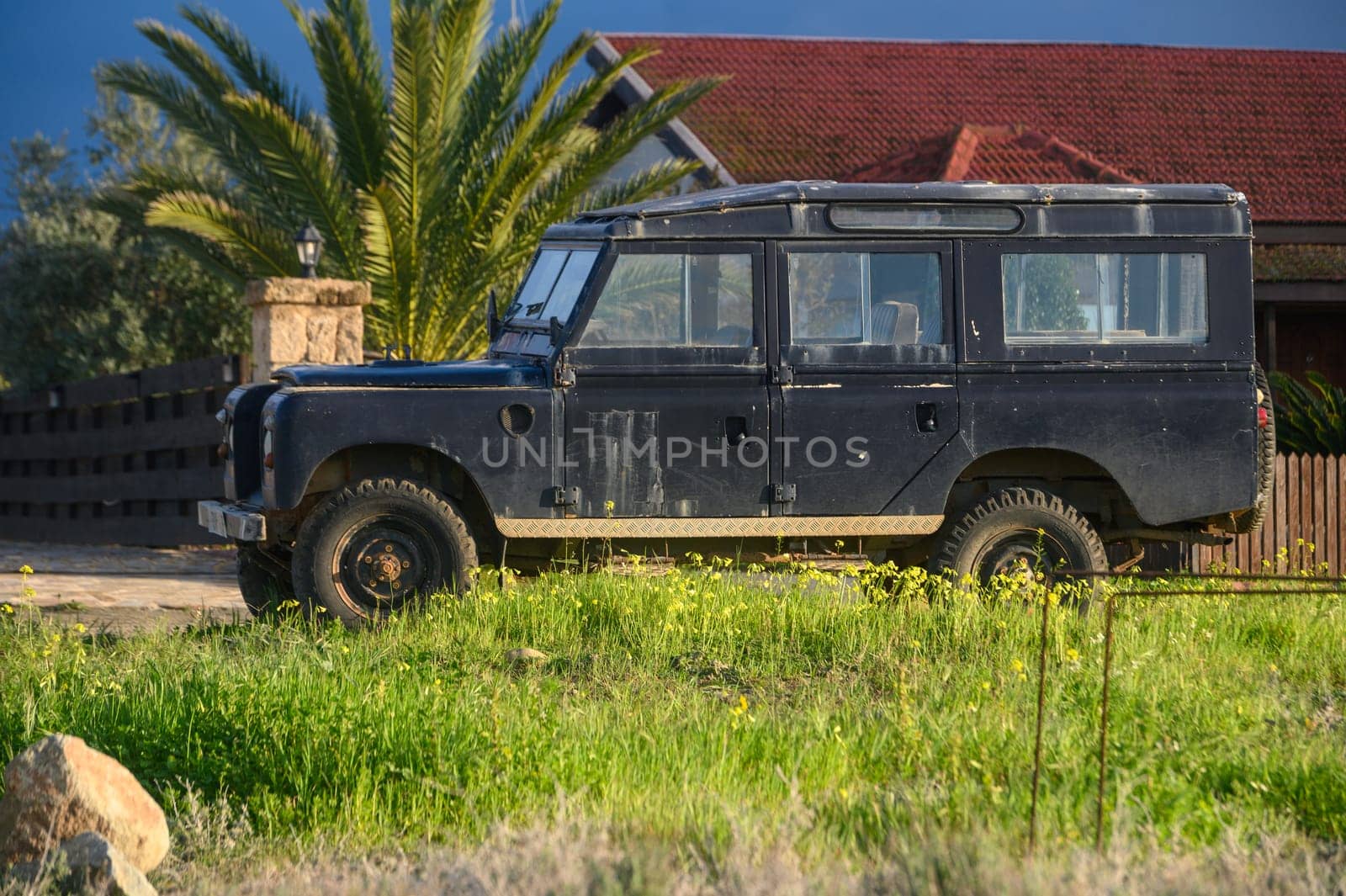 Gaziveren/Cyprus-05.02.2024: old SUV near a house in the village 1 by Mixa74