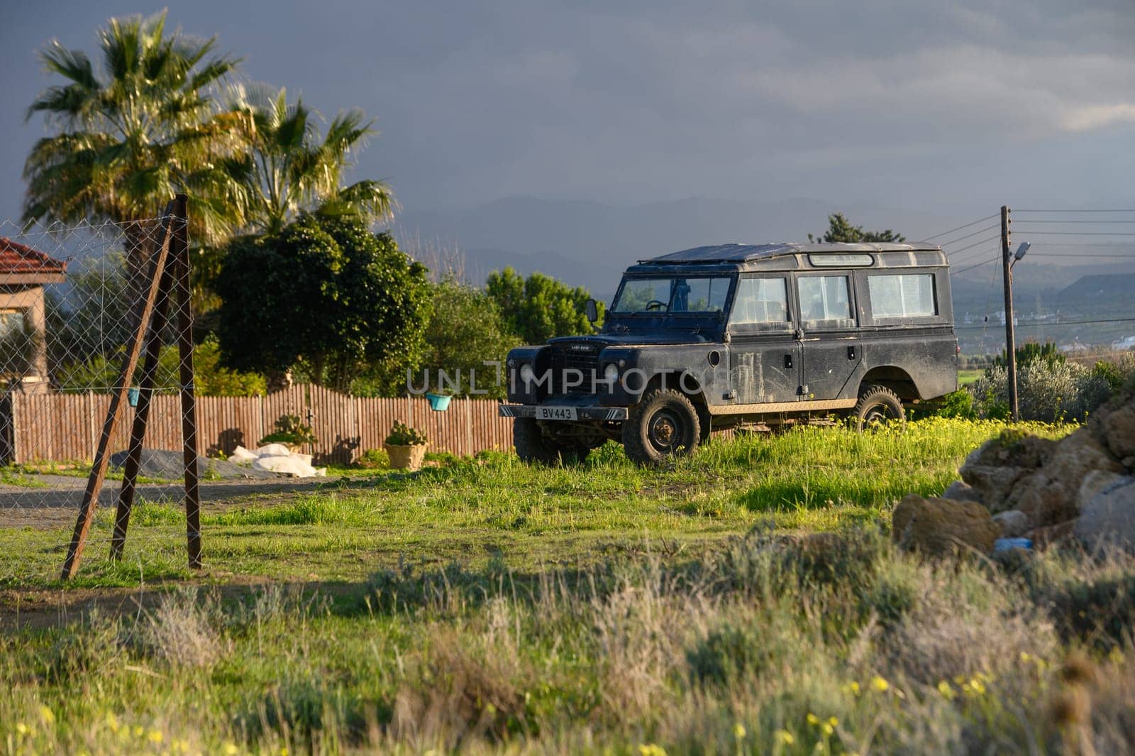 Gaziveren/Cyprus-05.02.2024: old SUV near a house in the village 2