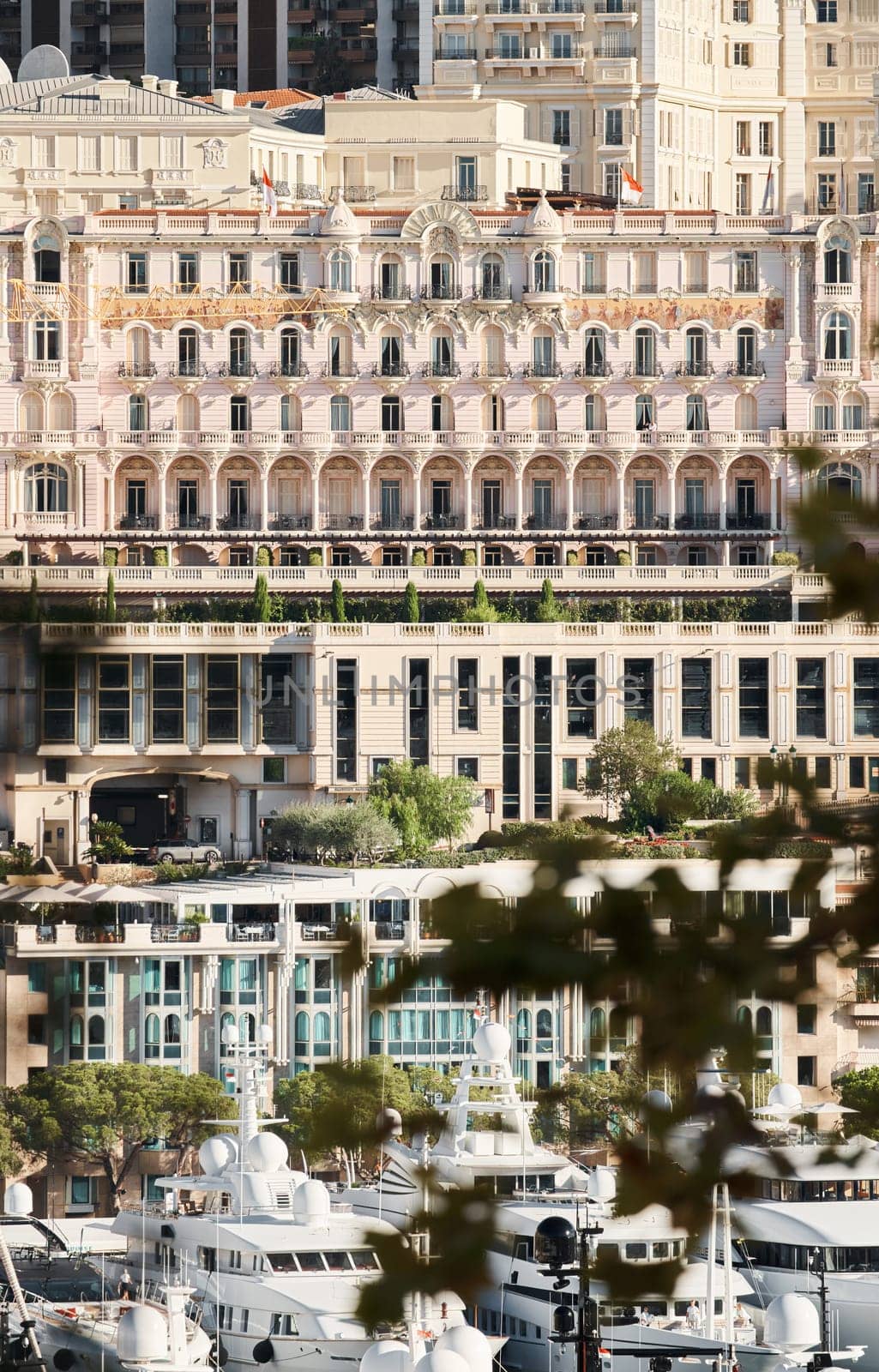 Monaco, Monte Carlo, 01 October 2022 - facades of famous buildings at the famous motorboat exhibition at morning, mega yacht show, novelties of the boating industry by vladimirdrozdin