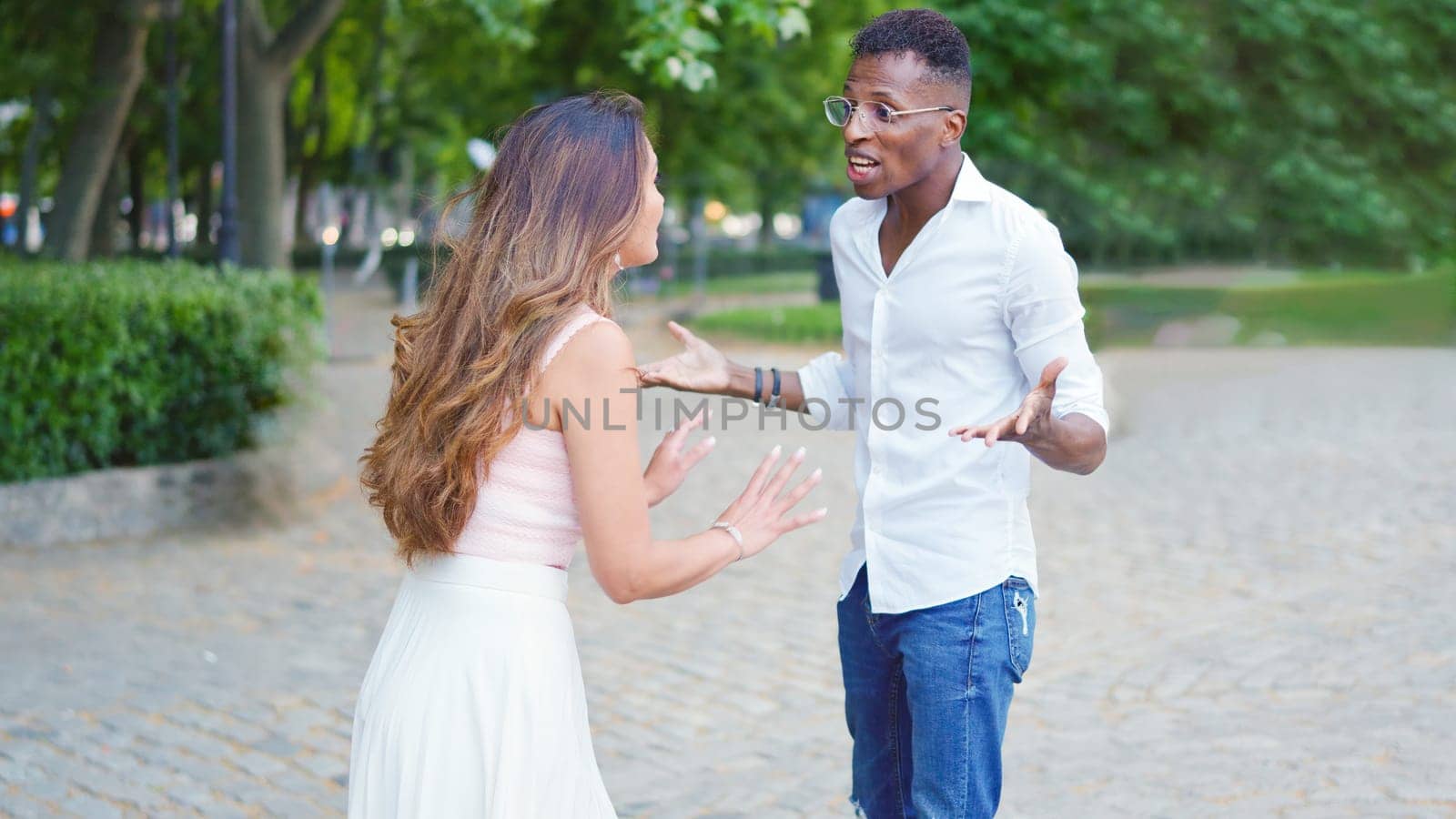 Woman trying to calm down her angry boyfriend