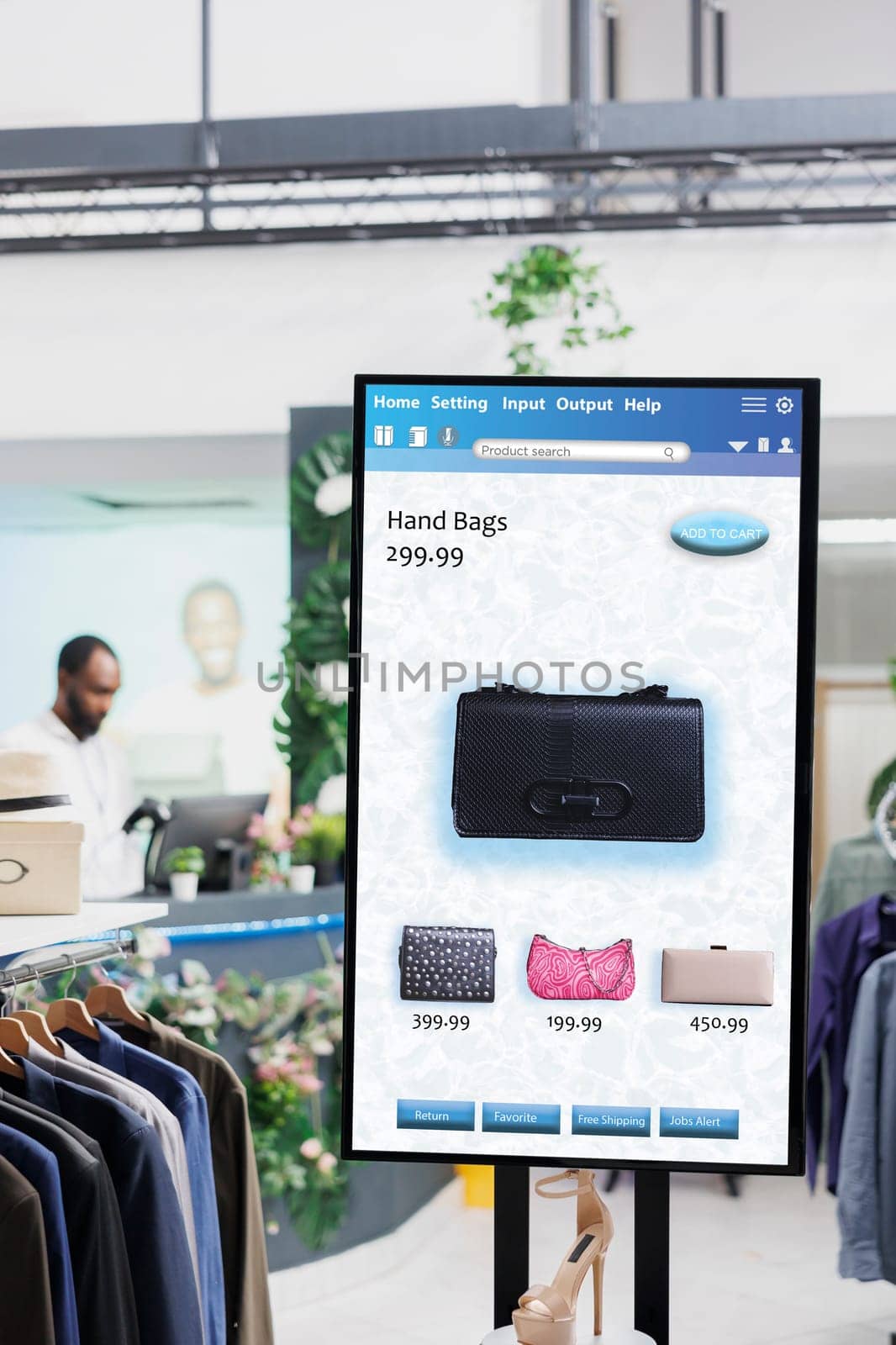 Modern self ordering kiosk display with different fashion items for clients to choose and purchase, self service concept. Interactive touch screen board clothes selection, e commerce.