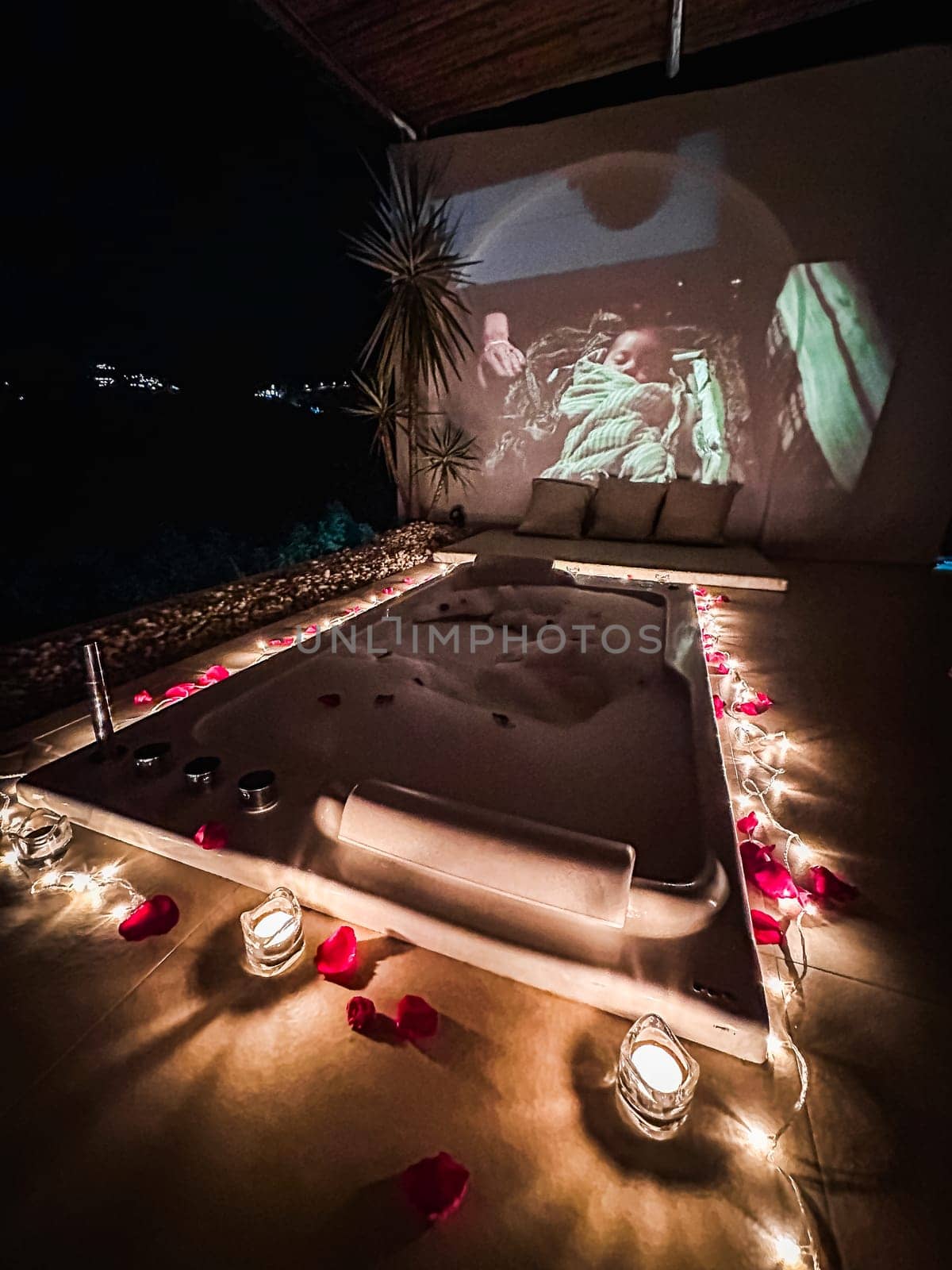 Night jacuzzi bathtub with movie projection in Doi Chang in Chiang Rai, Thailand, south east asia