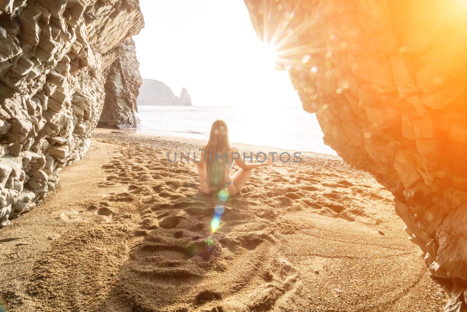 Woman sea pilates. Sporty happy middle aged woman practicing fitness on beach near sea, smiling active female training on yoga mat outside, enjoying healthy lifestyle, harmony and meditation. by panophotograph