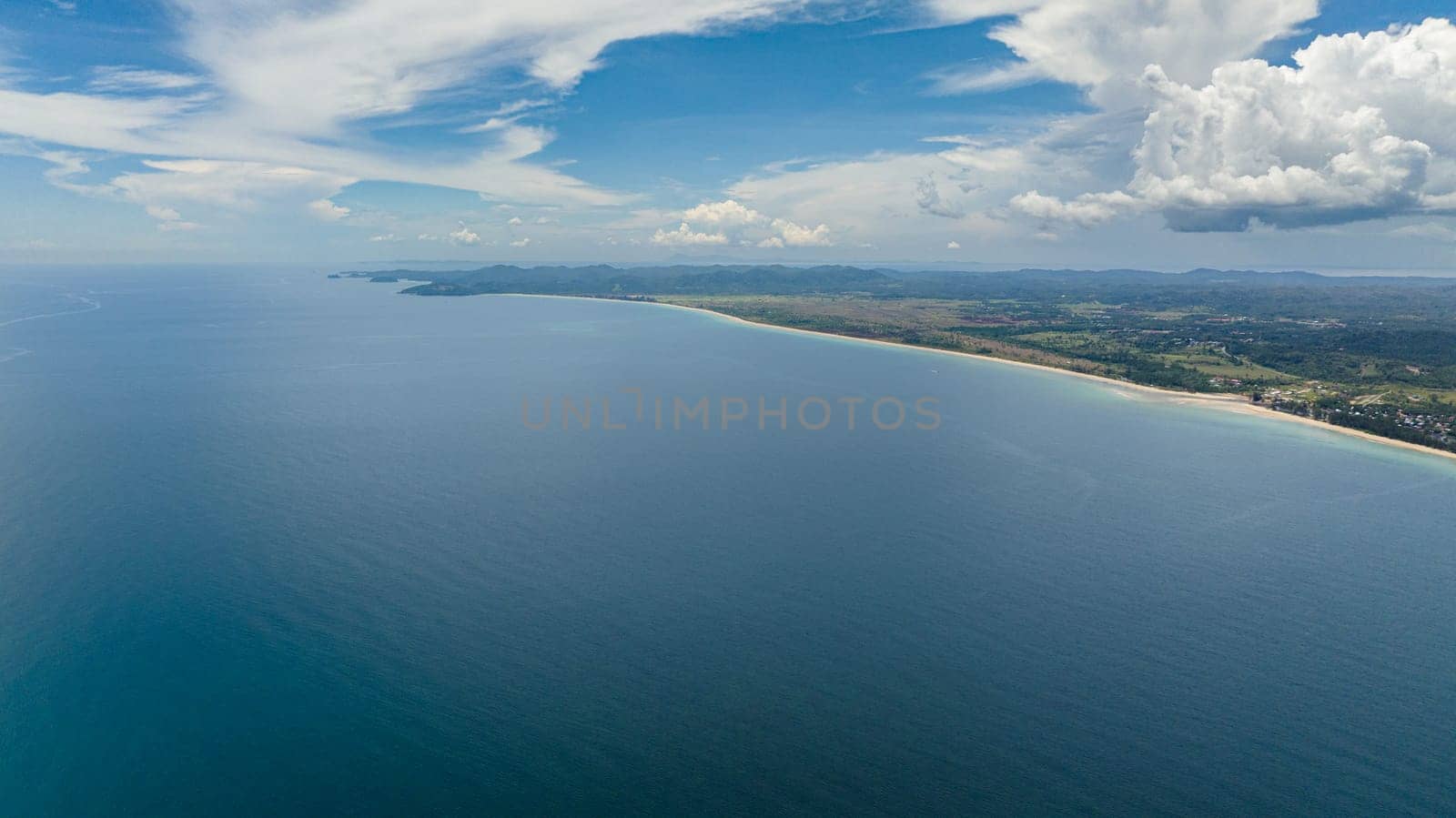 Coast of Borneo island with sandy beach. Borneo, Malaysia.