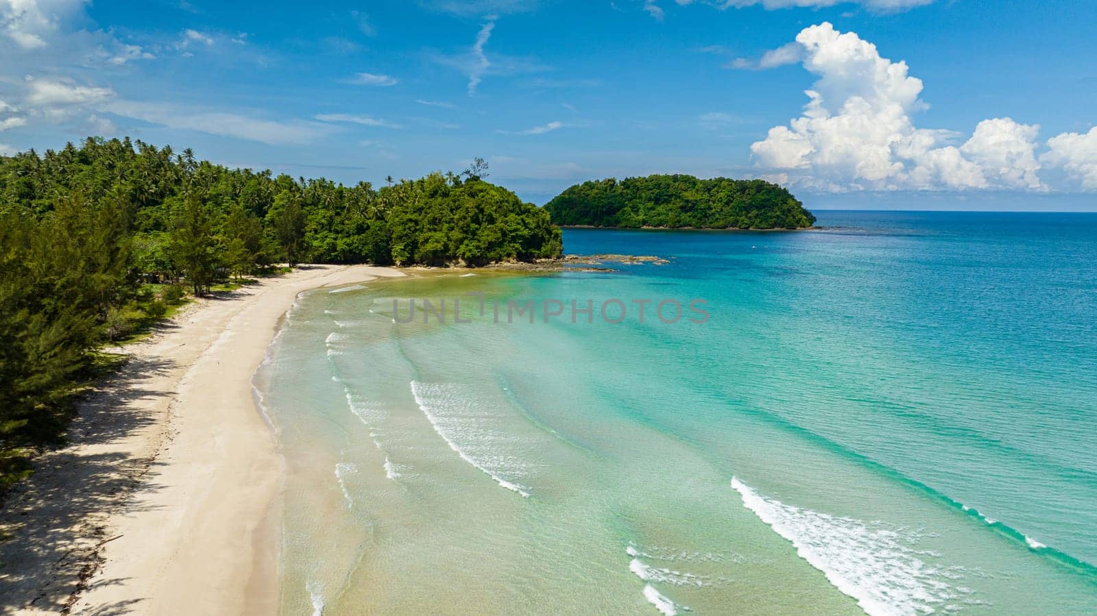 Tropical sandy beach and blue ocean. Borneo, Malaysia. Bavang Jamal Beach