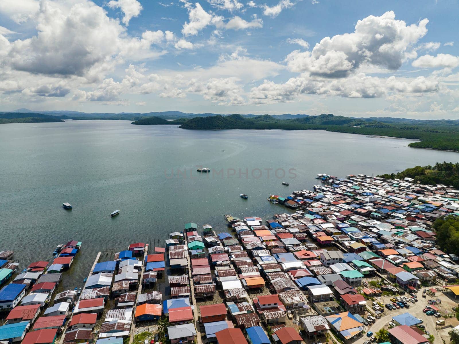 Village of fishermen with houses on the water. Kudat, Sabah, Borneo.