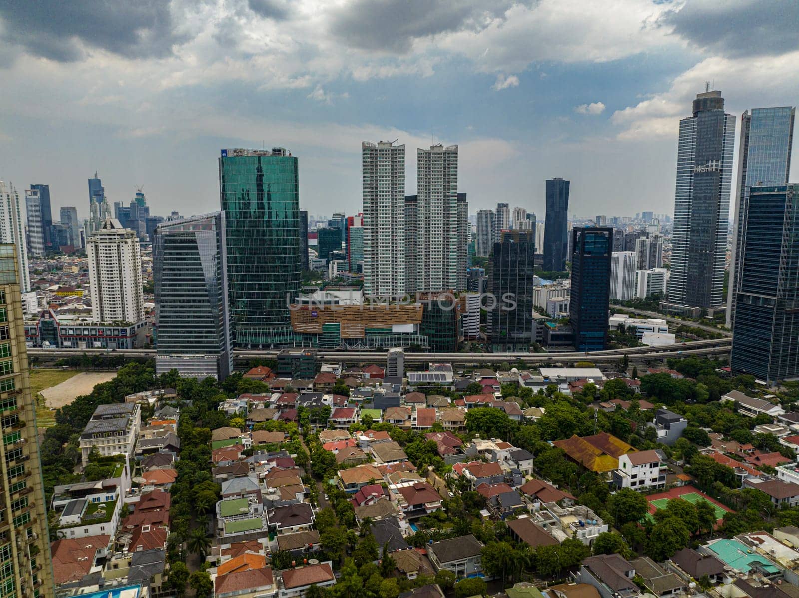 Aerial view of Jakarta business district in Indonesia capital city with many modern skyscrapers. Indonesia.