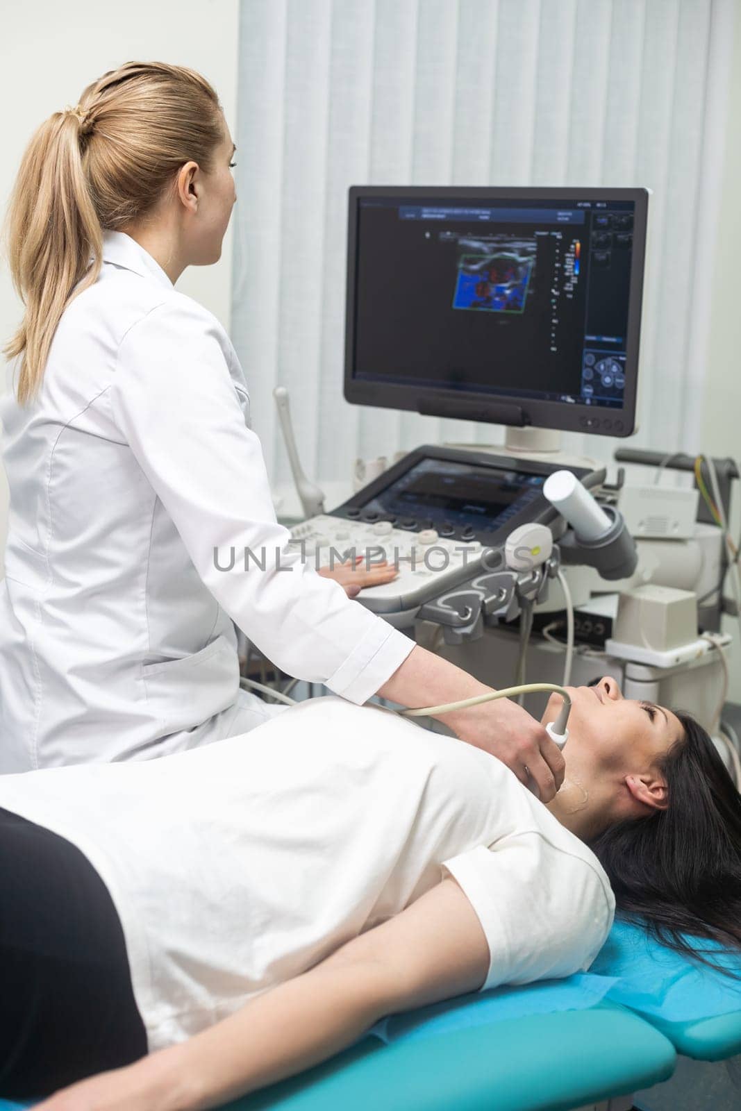 Ultrasound scanner in the hands of a doctor. Diagnostics. Sonography