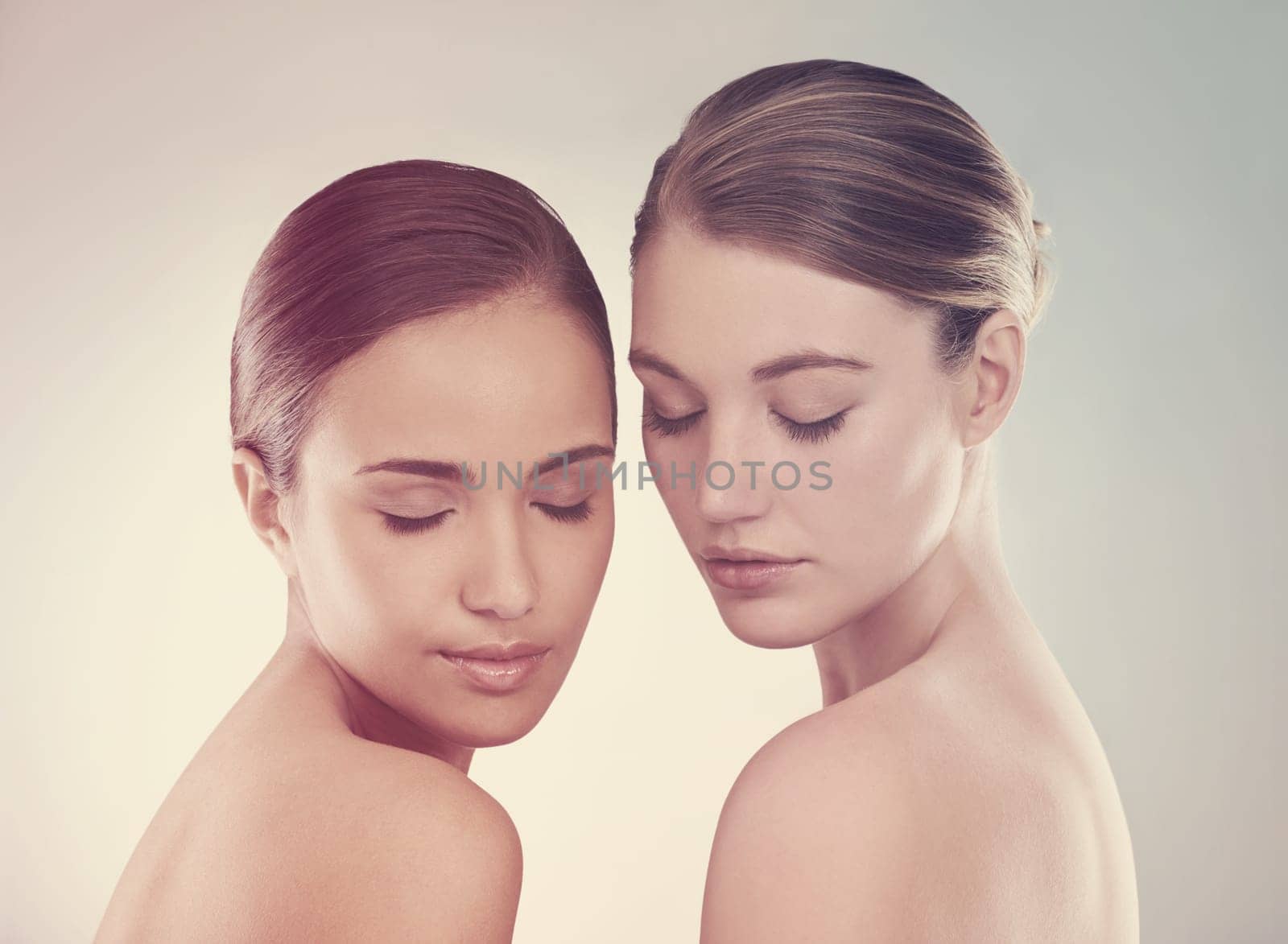 Calm woman, skincare and natural beauty in relax for makeup or cosmetics on a studio background. Face of young female friends, people or models posing for facial treatment, spa or salon on mockup.