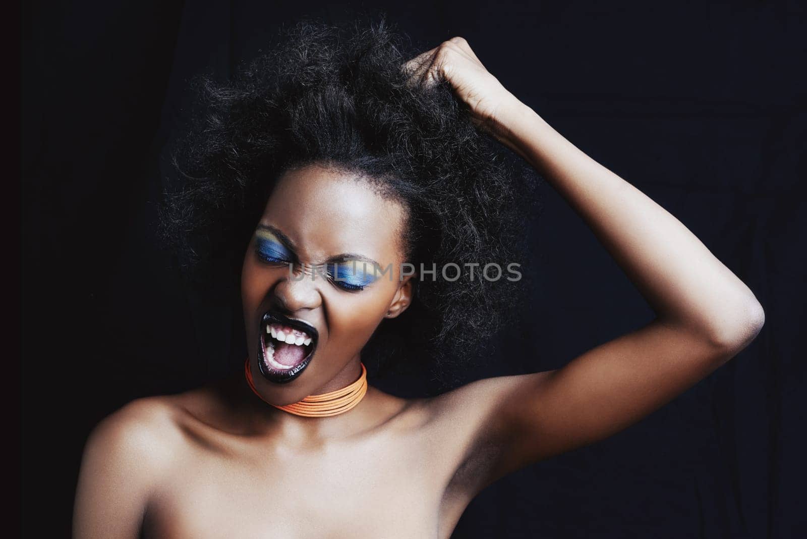 Beauty, hair and frustrated black woman on dark background for hairstyle, texture and natural afro. Haircare, salon crisis and angry African person with cosmetics, accessories and makeup in studio.