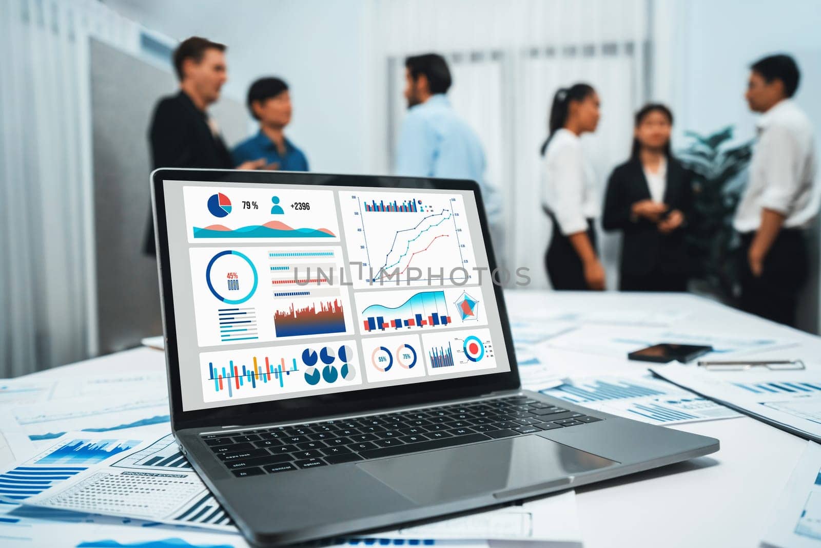 Analytic database by BI Fintech dashboard displayed on laptop for analyzed financial data on blur background with business people analyzing for insights power into business marketing planning.Prudent