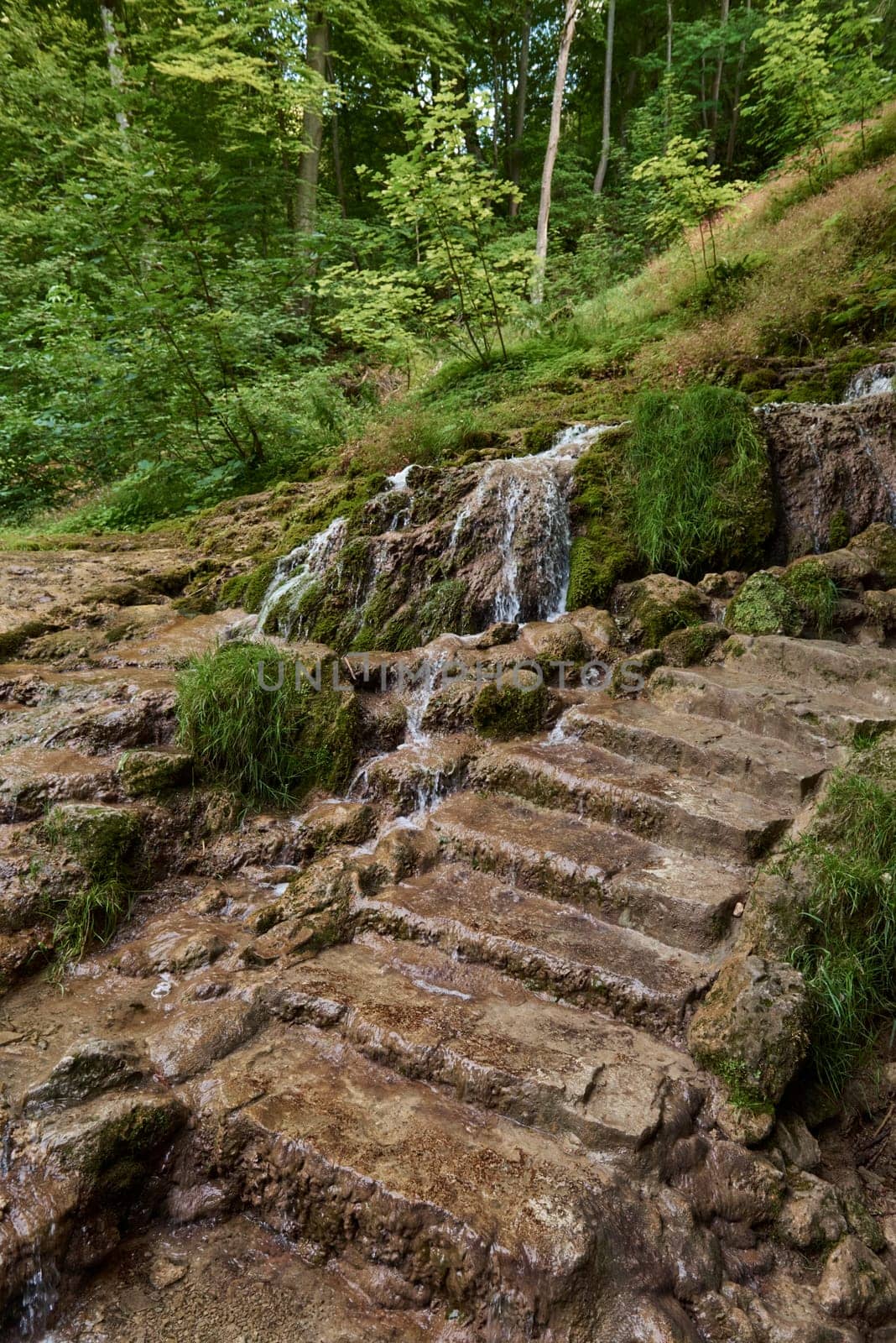 Urach Waterfall in Baden-Wurttemberg, Germany During Summer. Urach Waterfall in Baden-Wurttemberg, Germany During Summer by Andrii_Ko