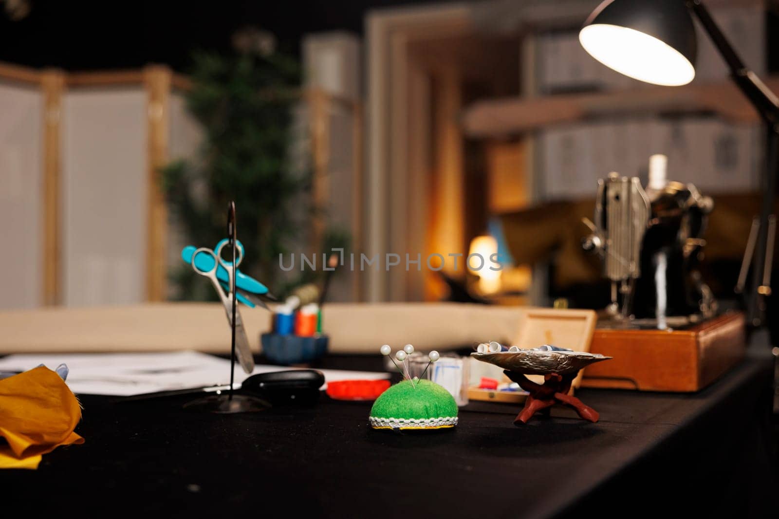 Scissors, needles, threads in atelier by DCStudio