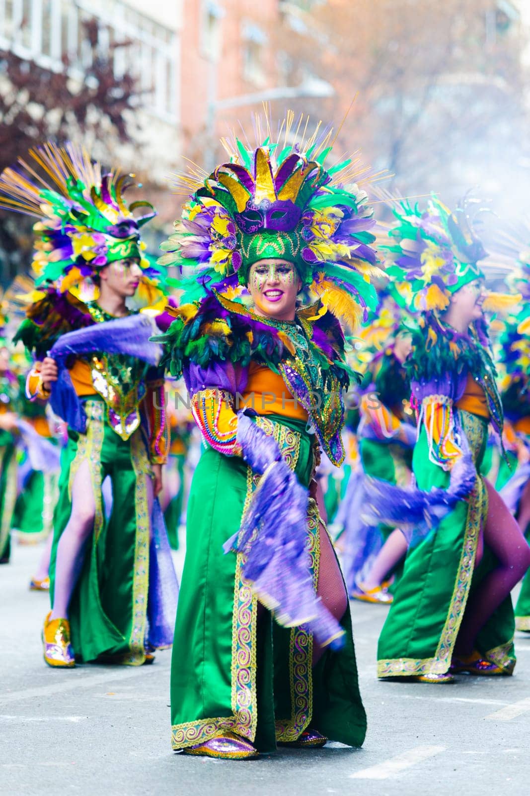 Badajoz, Spain, sunday. February 13 2024. Carnival parade through the streets of Badajoz