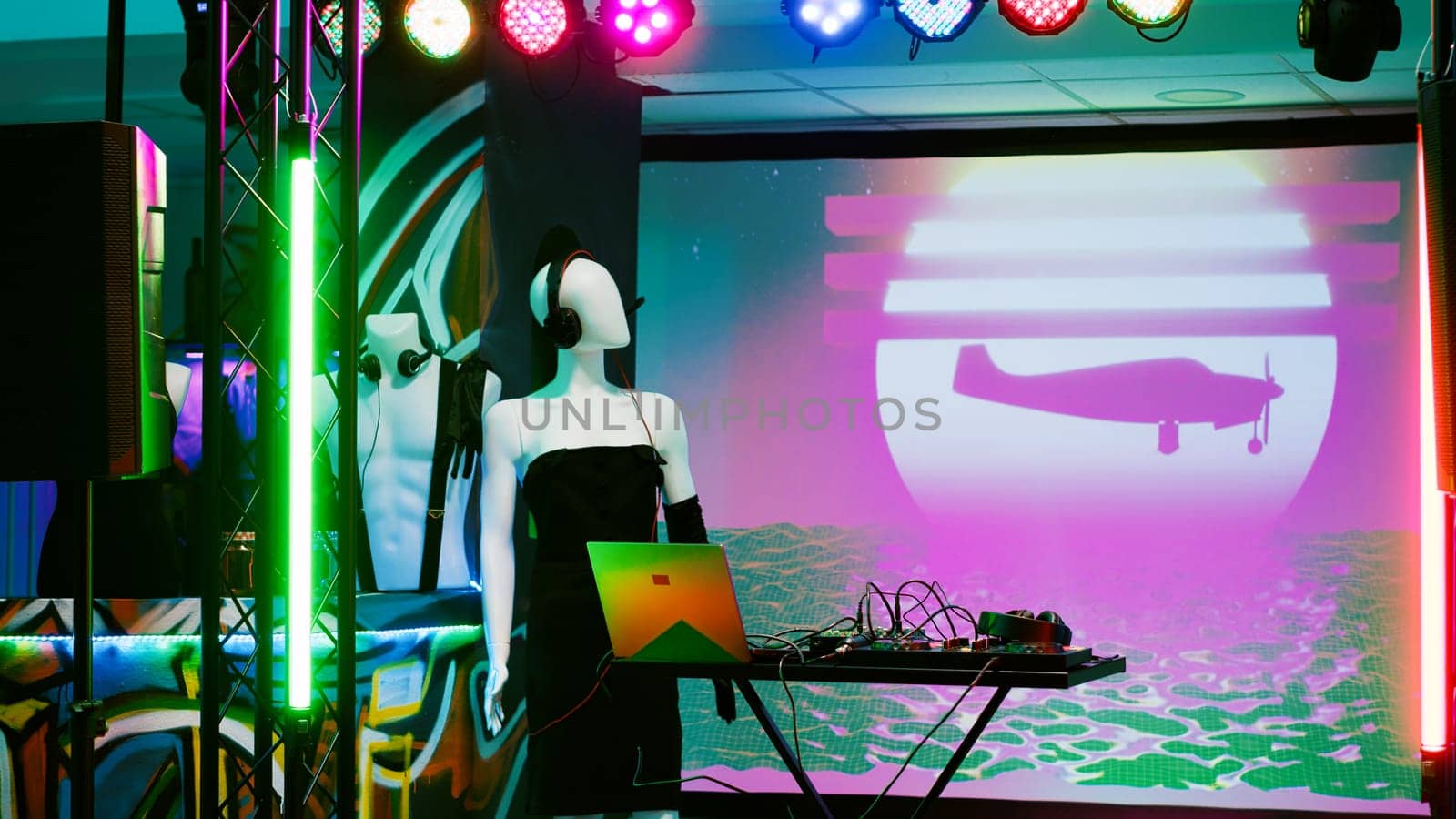 DJ mixing equipment at underground club by DCStudio