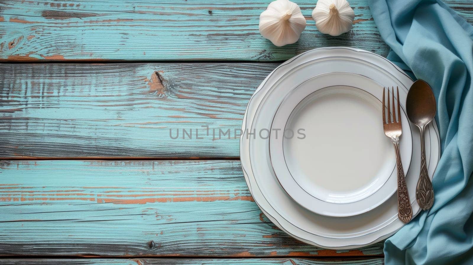 A plate, knife and fork on a blue tablecloth, AI by starush