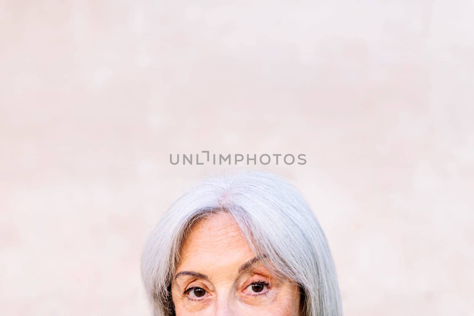 detail of the eyes of unrecognizable senior woman by raulmelldo