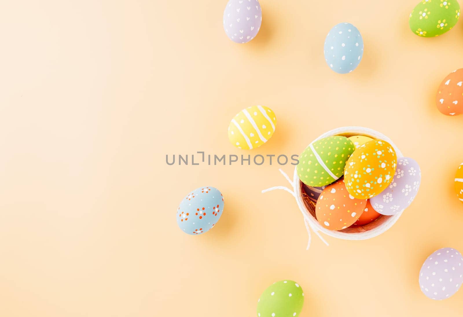 Colorful easter eggs isolated on pastel background with copy space, Funny decoration, Creative composition banner web design holiday background, Happy Easter Day greeting card, flat lay top view