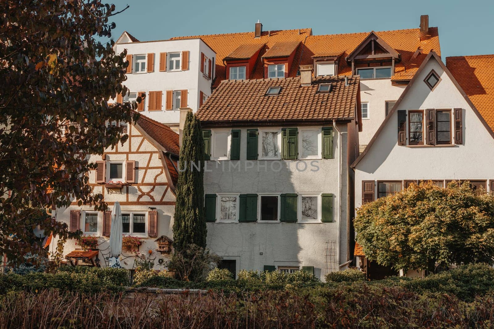 Old national German town house. Old Town is full of colorful and well preserved buildings. Baden-Wurttemberg is a state in southwest Germany bordering France and Switzerland. The Black Forest, known for its evergreen scenery and traditional villages, lies in the mountainous southwest. Stuttgart, the capital, is home to Wilhelma, a royal estate turned zoo and gardens. Porsche and Mercedes-Benz have headquarters and museums there. The 19th-century Hohenzollern Castle sits in the Swabian Alps to the south.