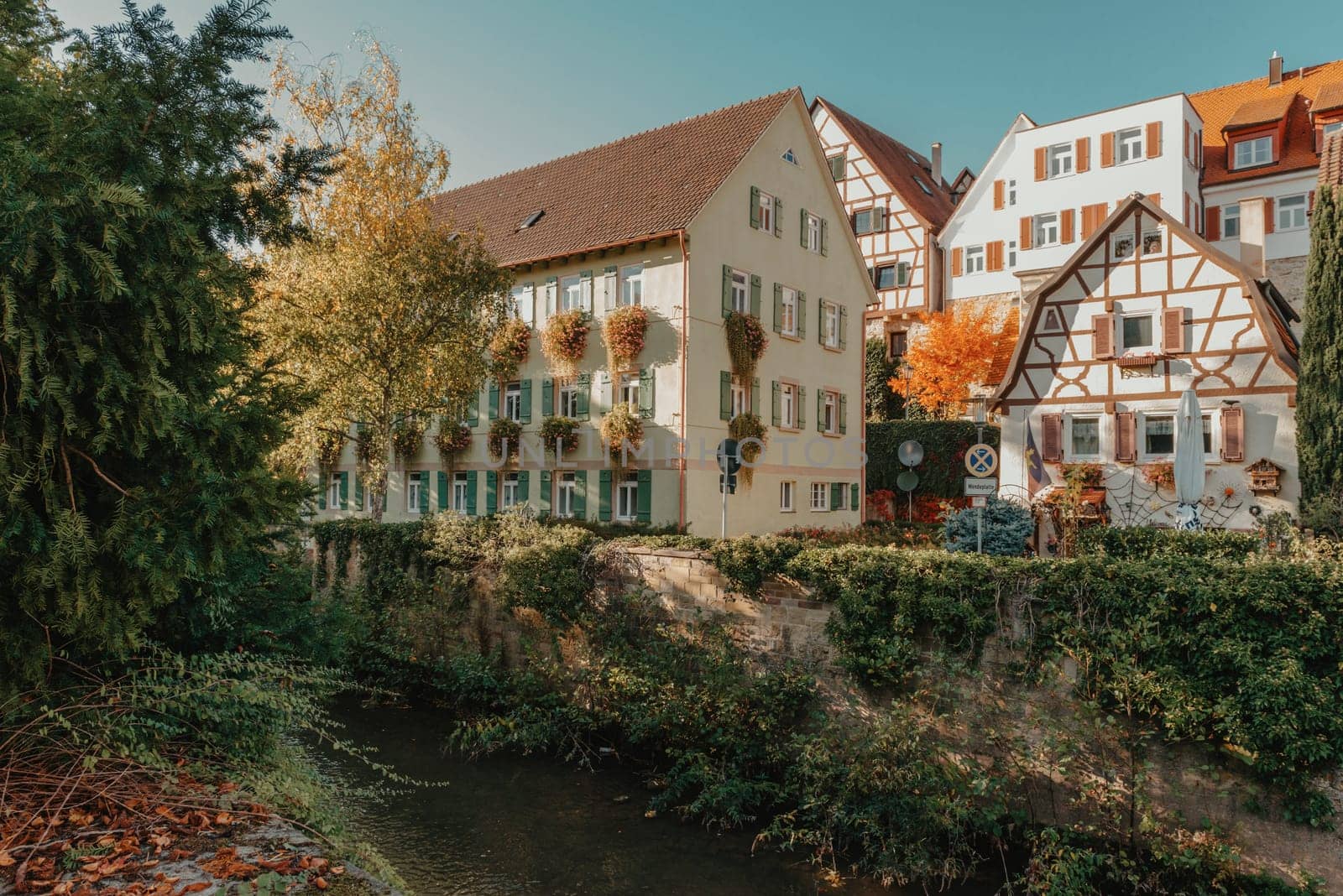 Old national German town house. Old Town is full of colorful and well preserved buildings. Baden-Wurttemberg is a state in southwest Germany bordering France and Switzerland. The Black Forest, known for its evergreen scenery and traditional villages, lies in the mountainous southwest. Stuttgart, the capital, is home to Wilhelma, a royal estate turned zoo and gardens. Porsche and Mercedes-Benz have headquarters and museums there. The 19th-century Hohenzollern Castle sits in the Swabian Alps to the south.