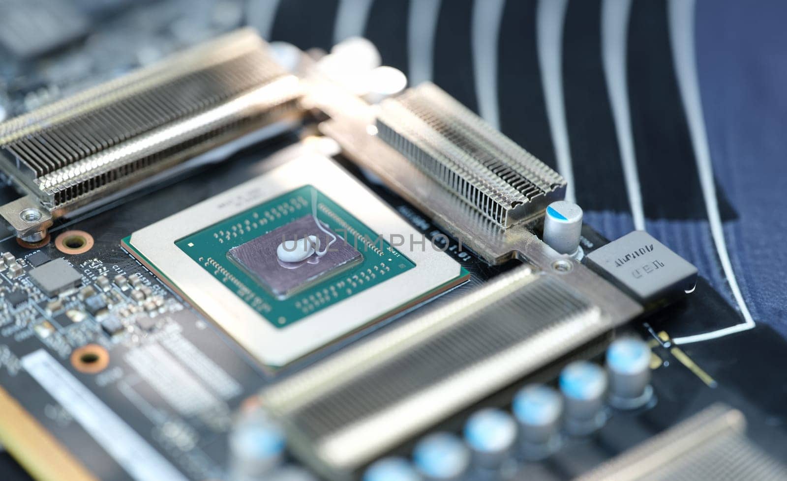 Thermal paste lying on processor from video card closeup by kuprevich