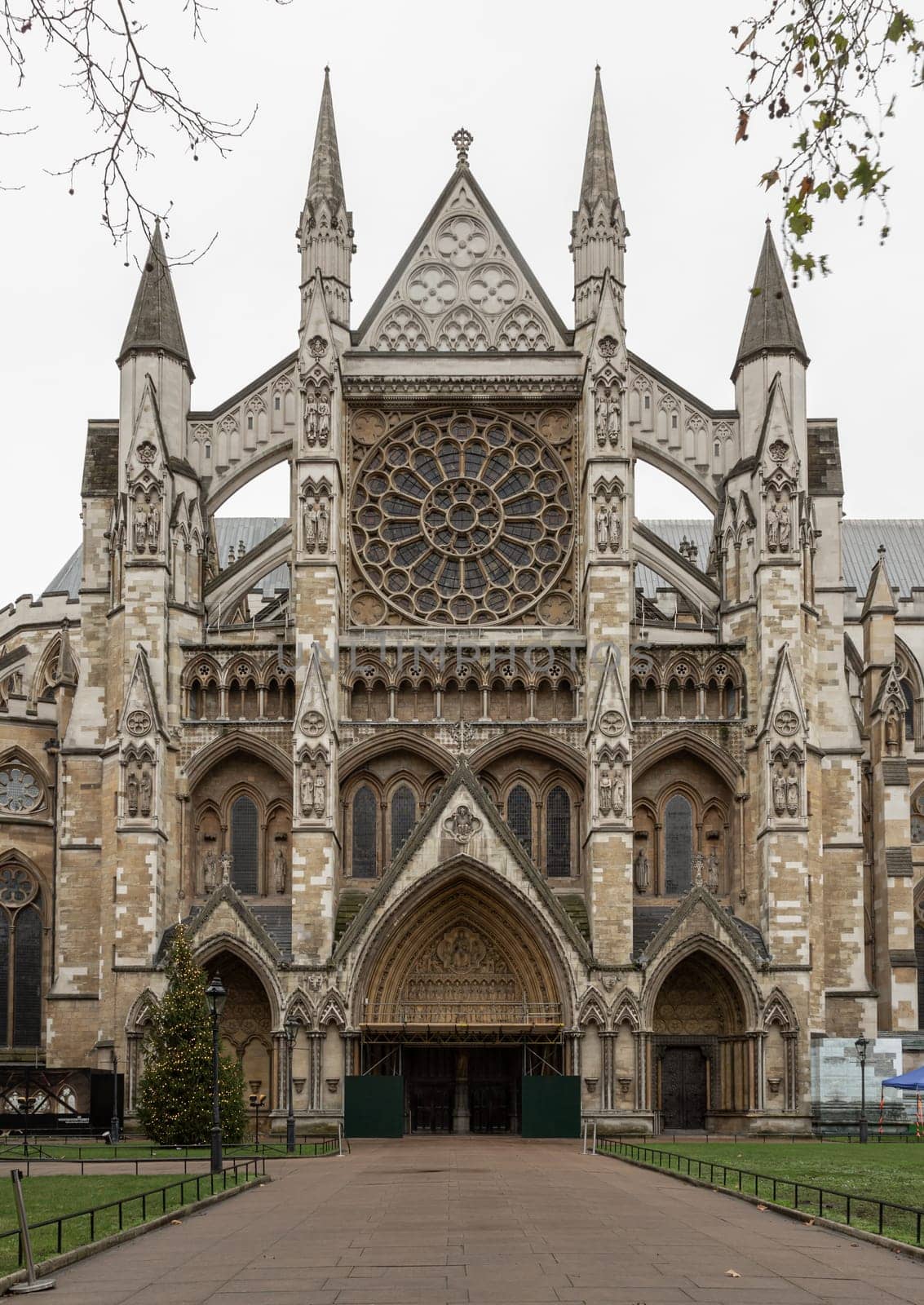 London, UK -​ Dec 25, 2023 - Exterior Architecture of The gothic Westminster Abbey (The Collegiate Church of St Peter at City of Westminster) is Traditional place of coronation and burial site for English monarchs, Space for text, Selective focus.