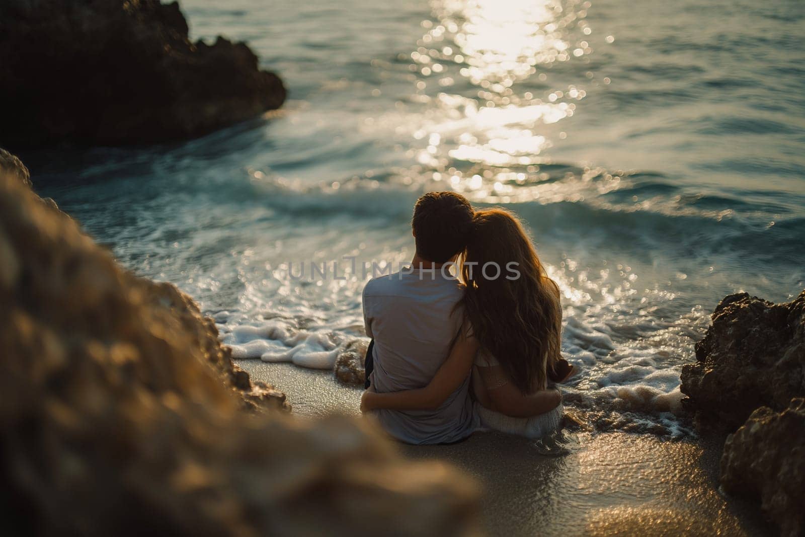 A happy couple sits in the water on the seashore, looking at the sunset by Sd28DimoN_1976