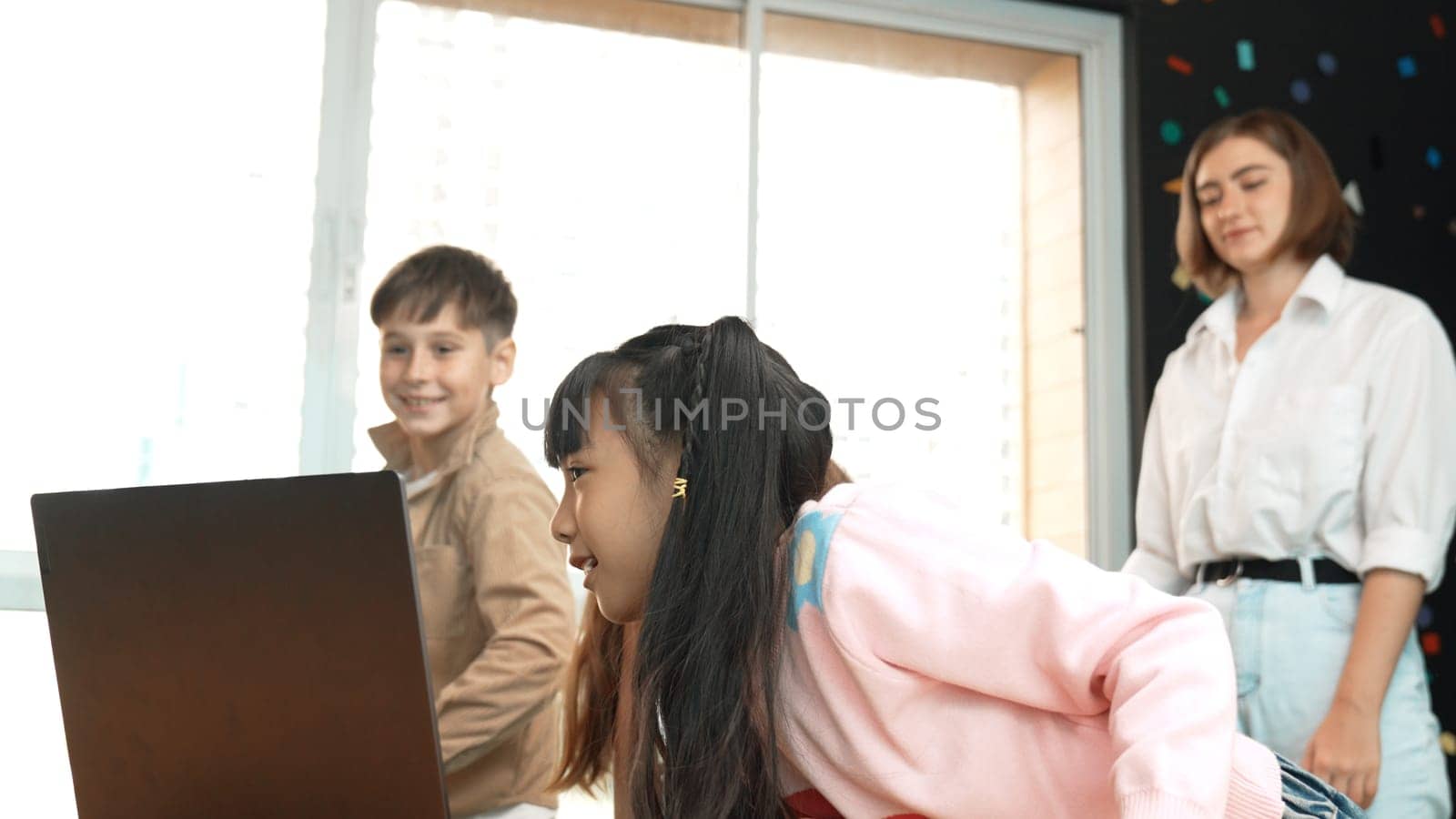 Young girl looking data at laptop screen while start presentation. Erudition. by biancoblue