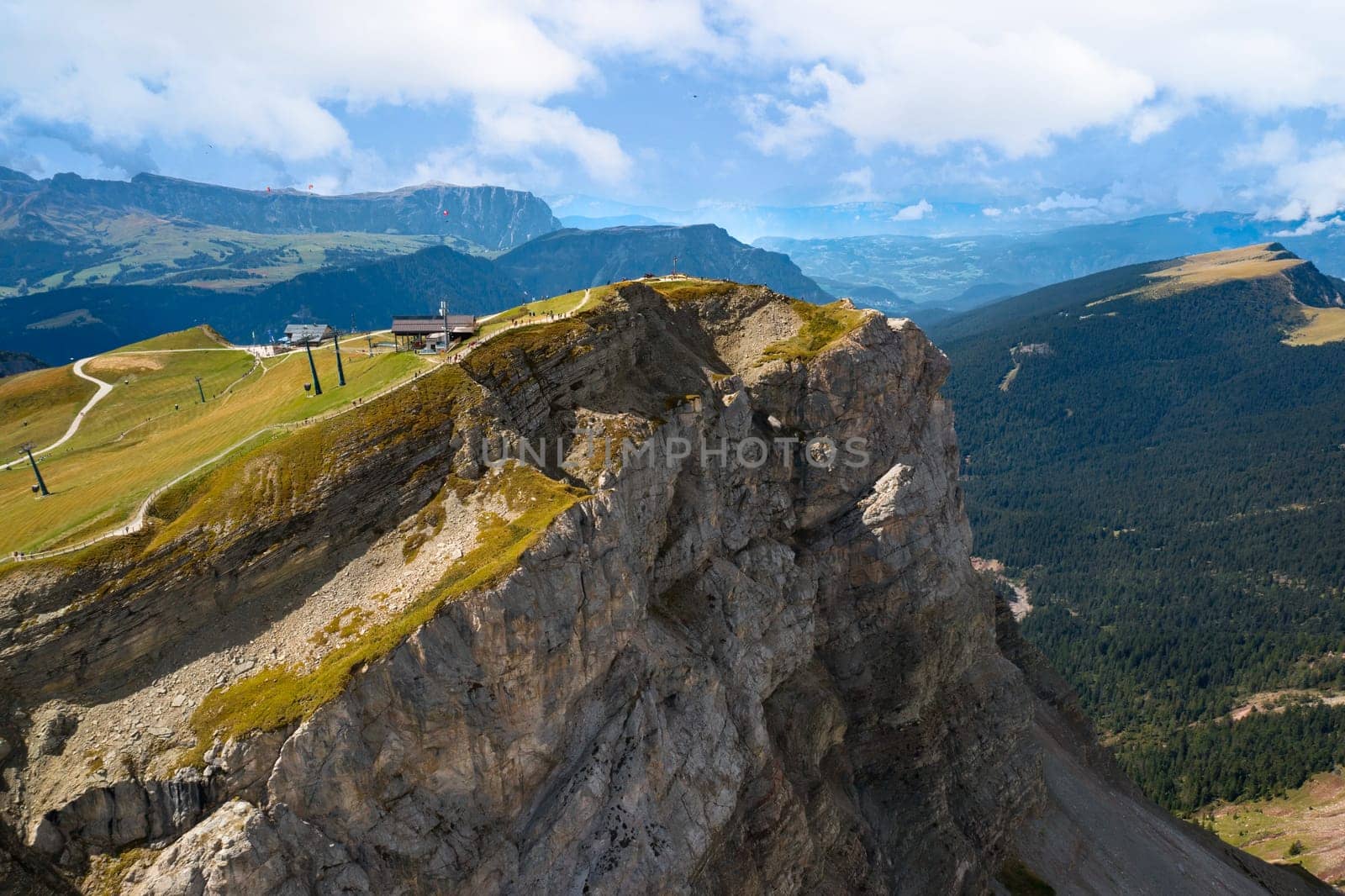 Views of the beautiful Seceda mountains, deep cliff valleys and tall mountains