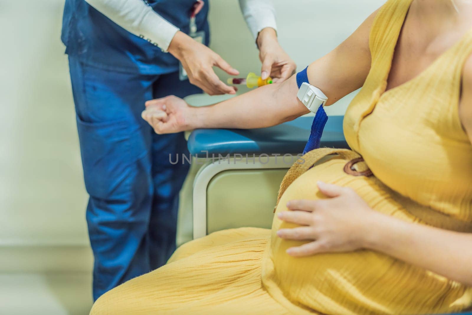 pregnant woman undergoes a blood test, a pivotal step in ensuring the well-being of both herself and her developing baby during the maternity journey by galitskaya