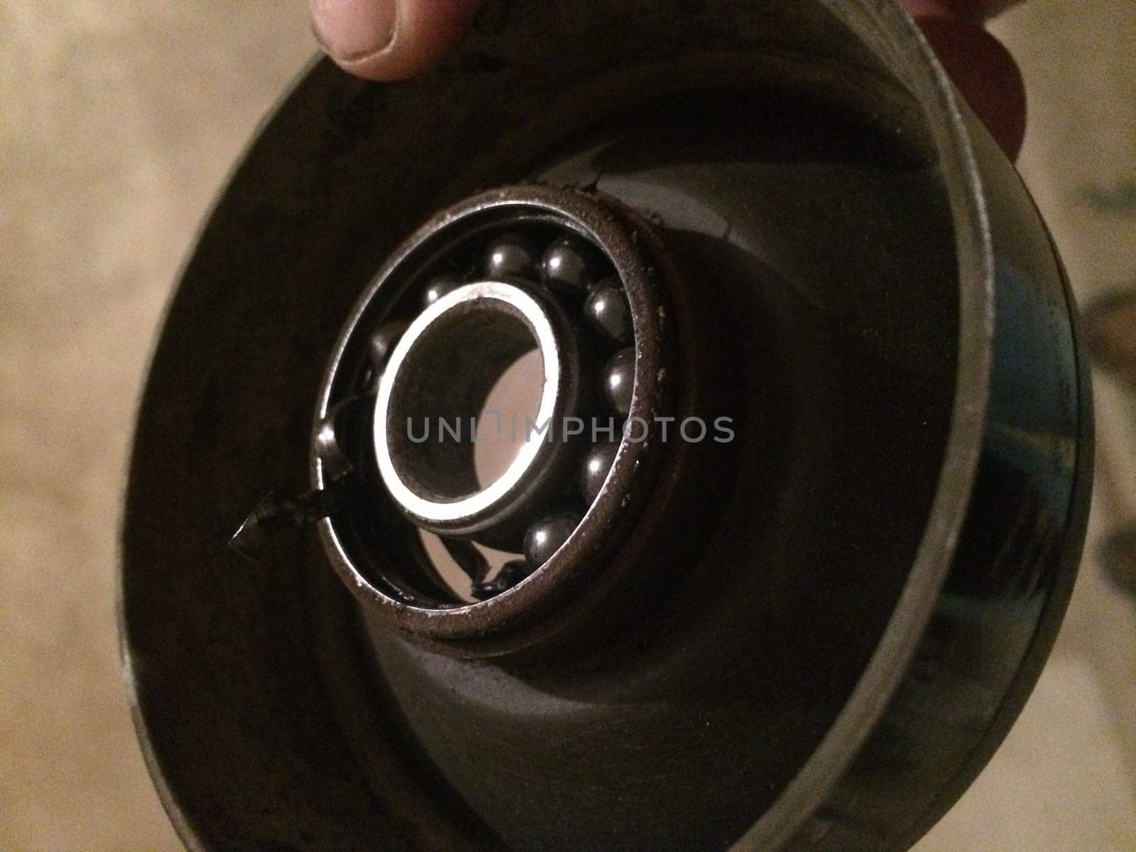 Broken Pulley For Car Belt, Missing Ball Bearings. High quality photo