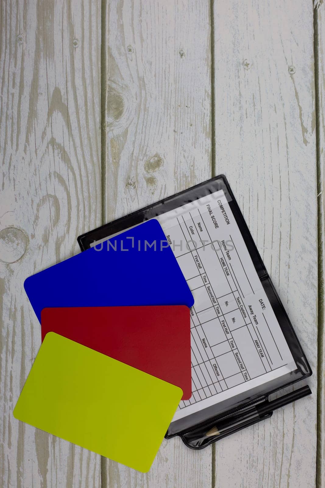 Set of football referee with notepad and blue card by timurmalazoniia