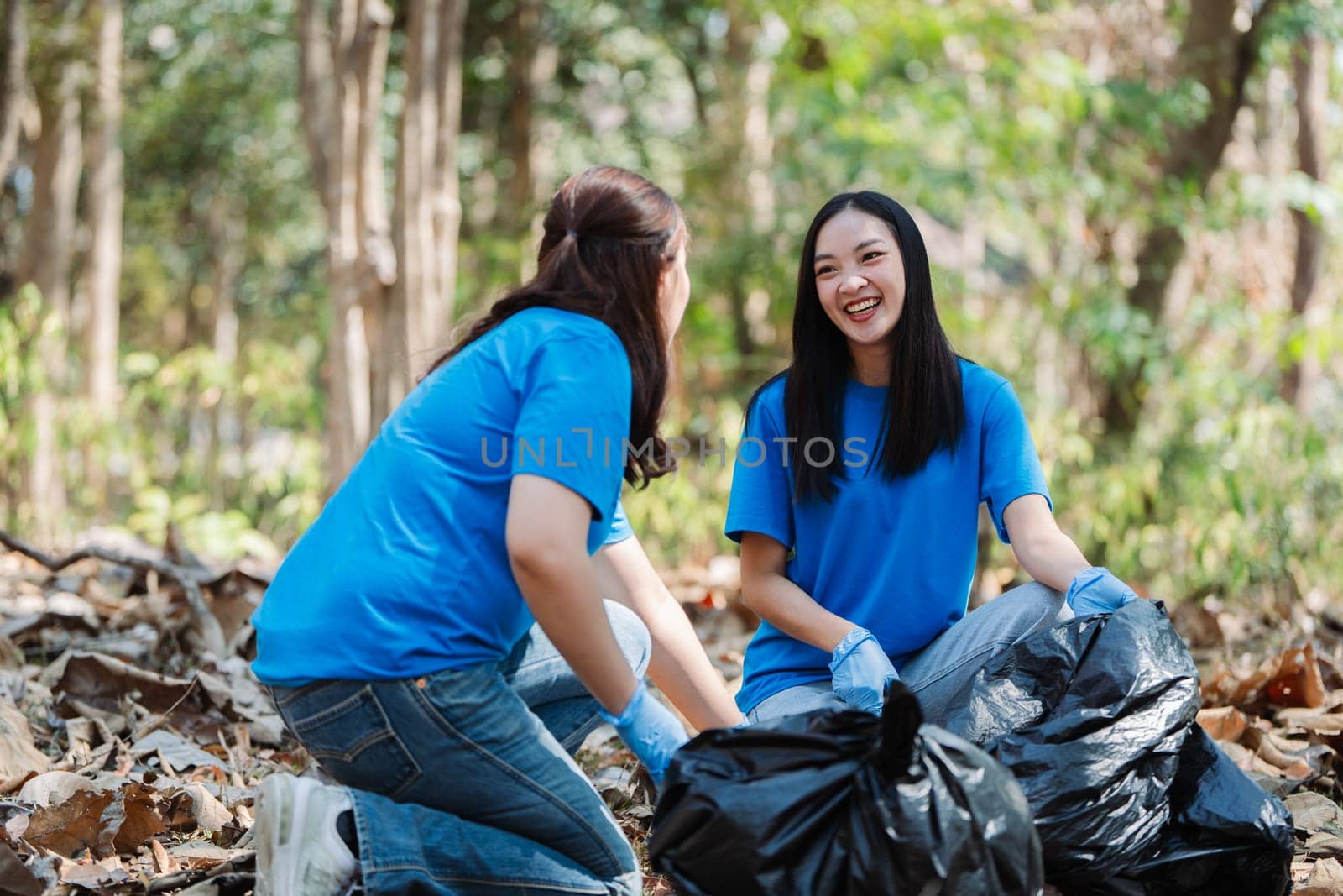 Volunteer team in nature for community service, teamwork and planning with leadership.