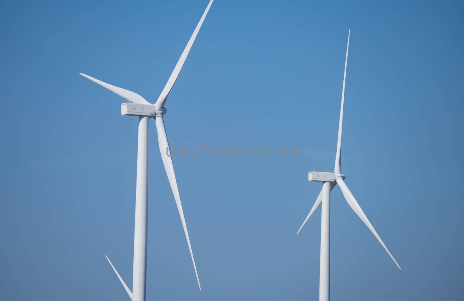 Wind energy. Wind power. Sustainable, renewable energy. Wind turbines generate electricity. Wind farm. Sustainable resources. Sustainable development. Green technology for energy sustainability. by Fahroni