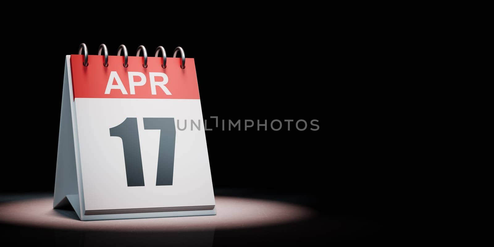 Red and White April 17 Desk Calendar Spotlighted on Black Background with Copy Space 3D Illustration