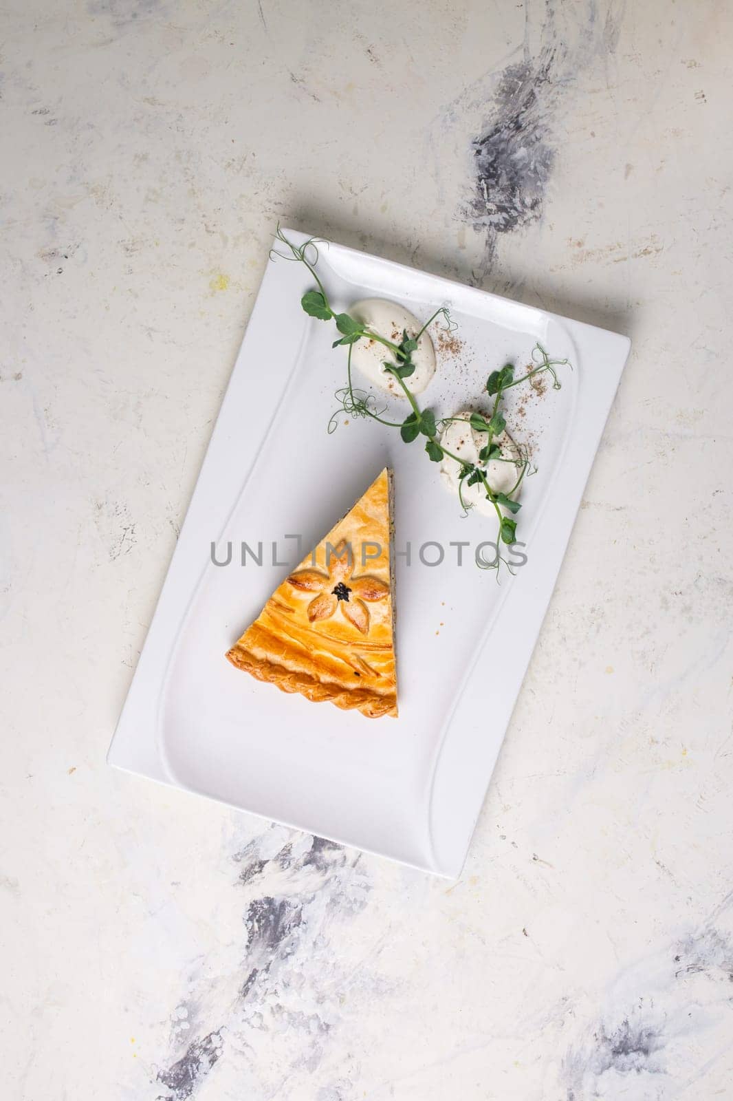 top view multi-layered meat and vegetable savory pie with a golden crust by Pukhovskiy