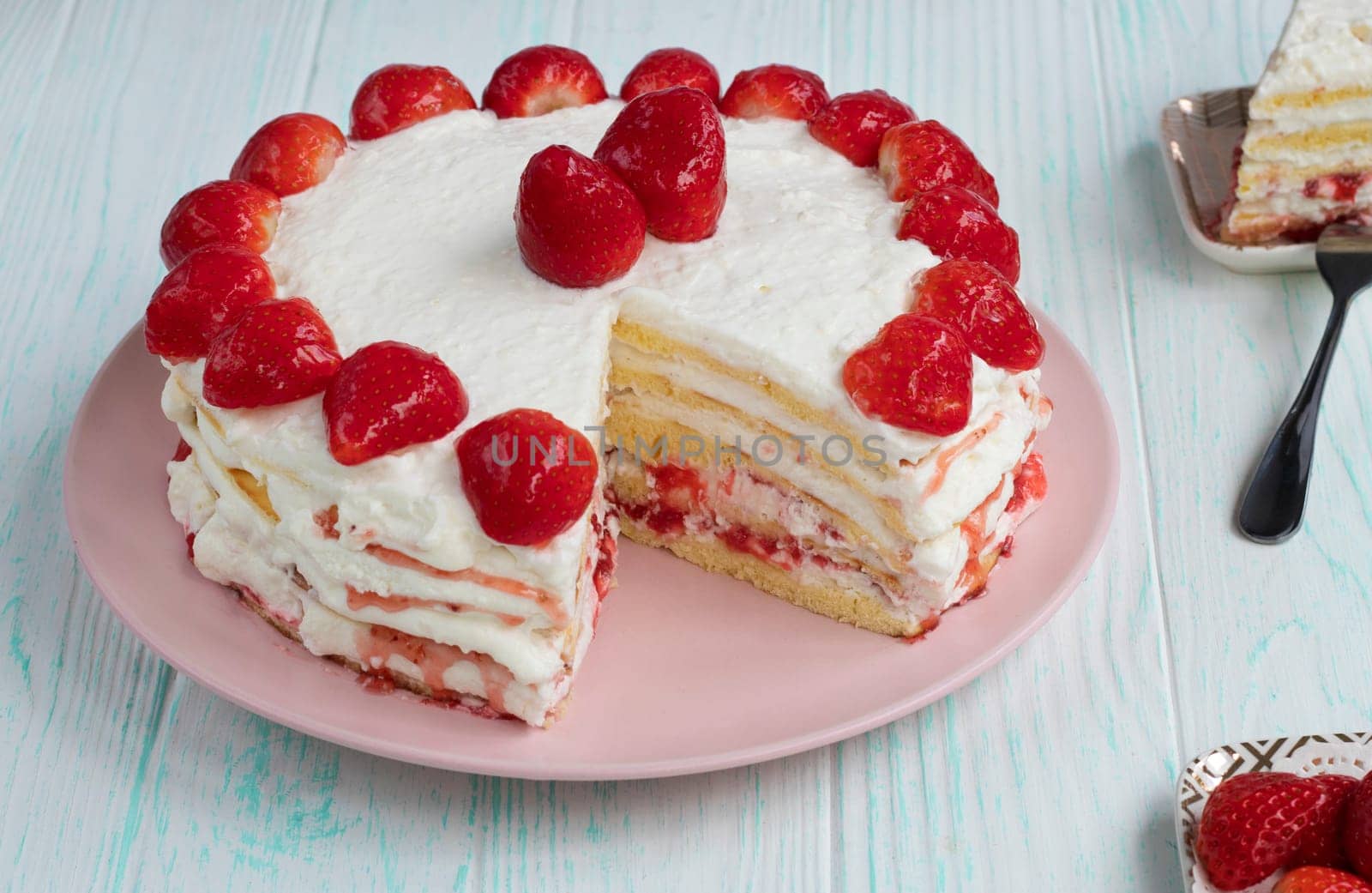 homemade strawberry cake cut. Strawberry pie decorated with fresh strawberries by Suietska