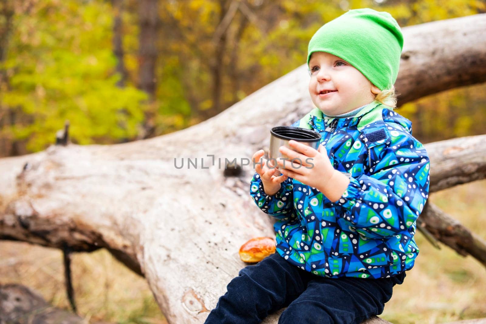 Child Enjoying Break on Nature Hike by andreyz