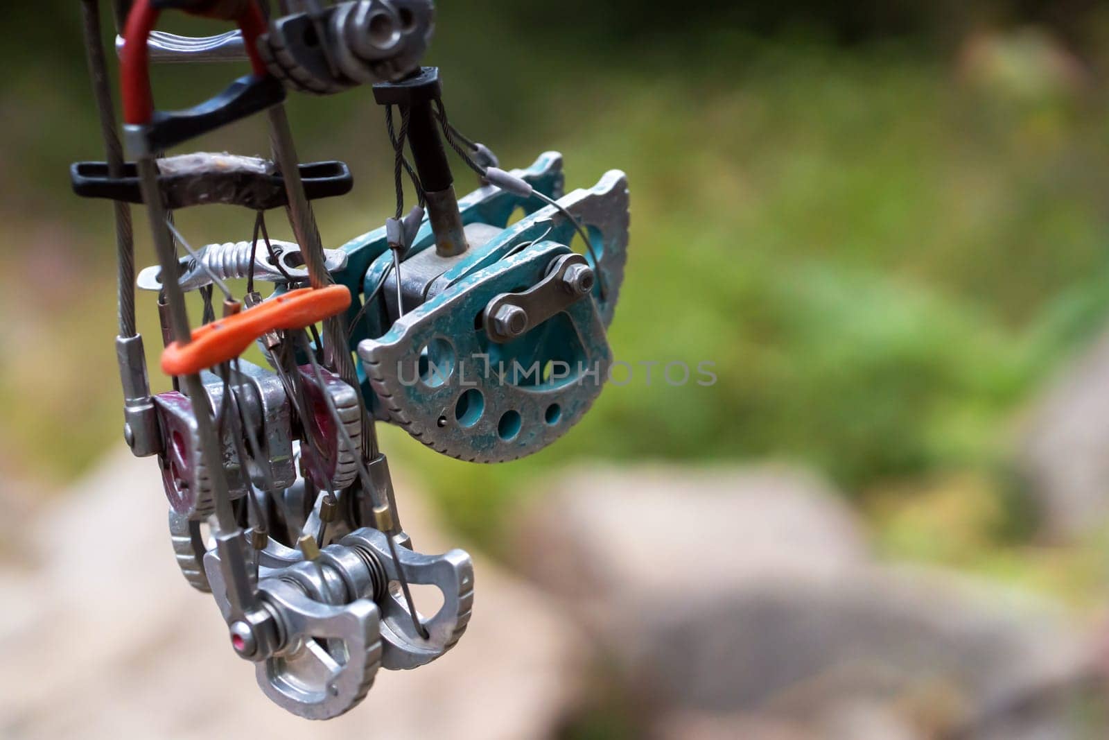 Climbing gear, mountaineering tools such as vintage rugged cams.