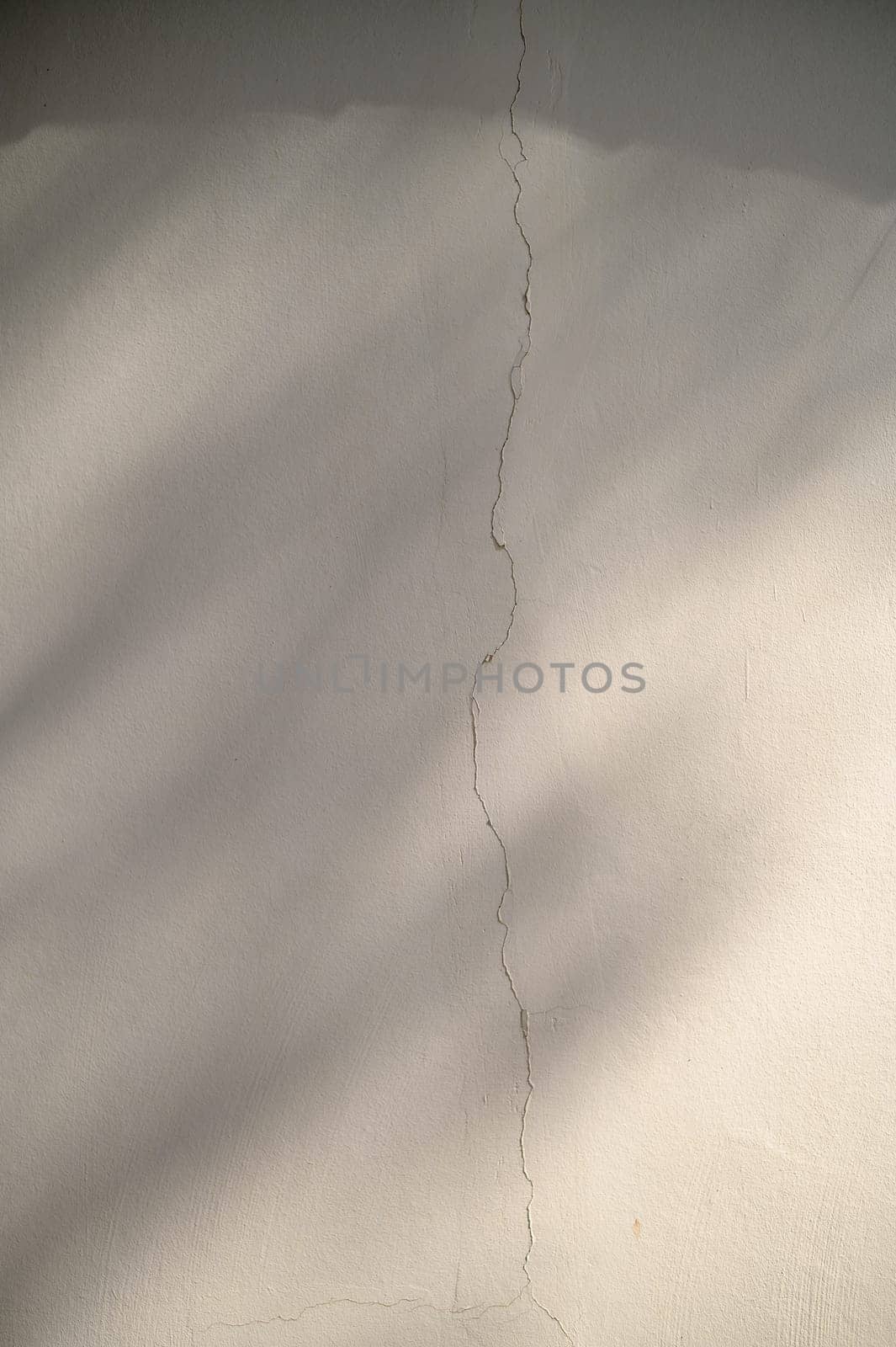 shadow on a plaster wall as a background 1