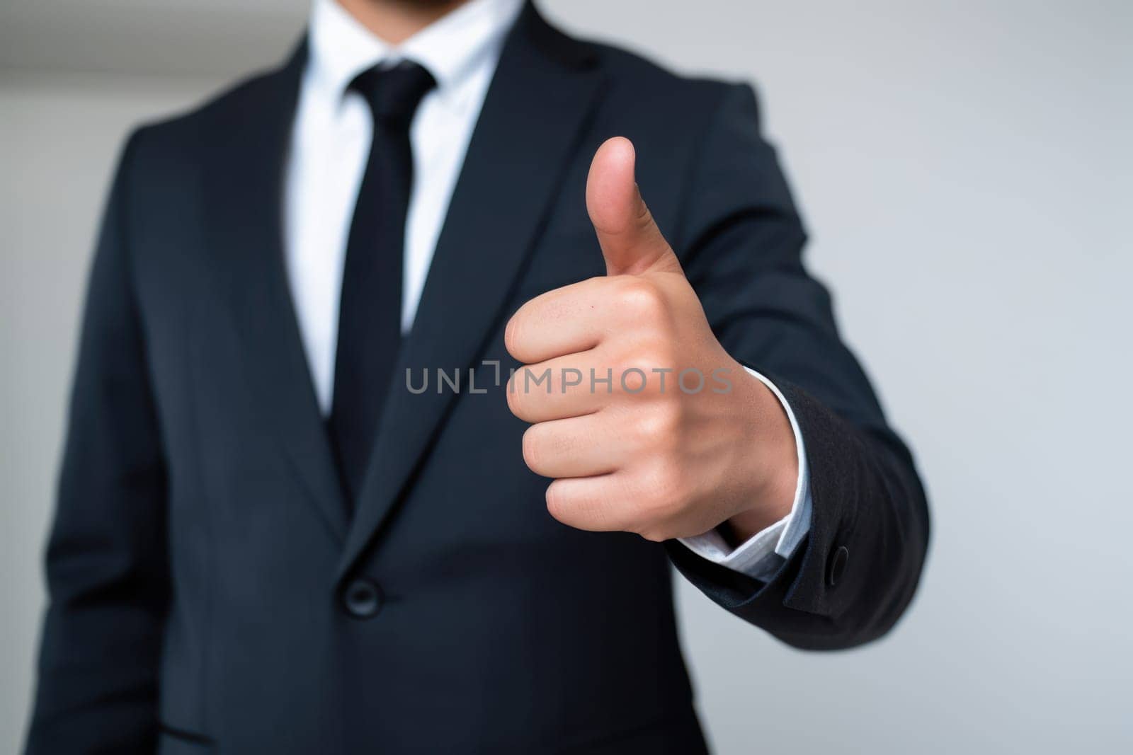 A man in a suit giving a thumbs up, created with Generative Ai by matamnad